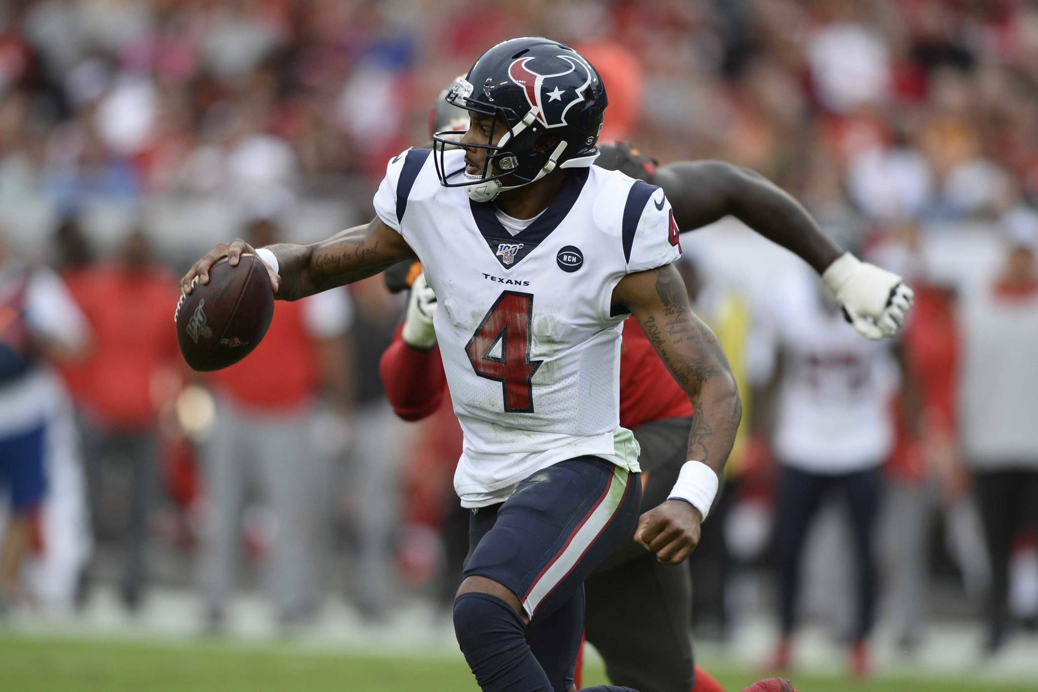 Houston Texans quarterback Deshaun Watson runs against the Tampa Bay Buccaneers during the second half of an NFL football game Dec. 21, 2019, in Tampa, Florida. (AP Photo/Jason Behnken)