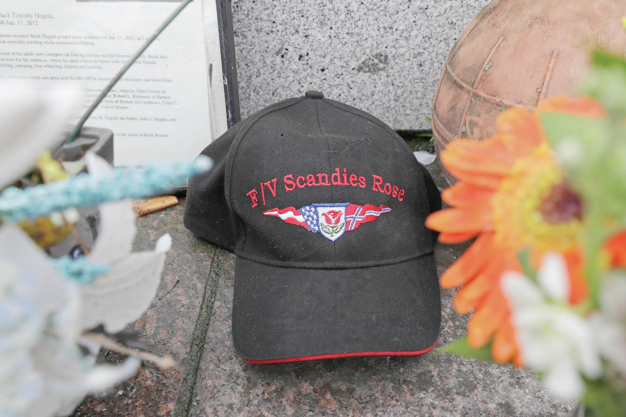 Ted S. Warren / Associated Press                                A ball cap with the name of the crab fishing boat Scandies Rose rests at the Seattle Fishermen’s Memorial on Thursday in Seattle. The search for five crew members of the Scandies Rose in Alaska has been suspended, the U.S. Coast Guard said after two other crew members of the vessel were rescued after the 130-foot crab fishing boat from Dutch Harbor sank on New Year’s Eve.