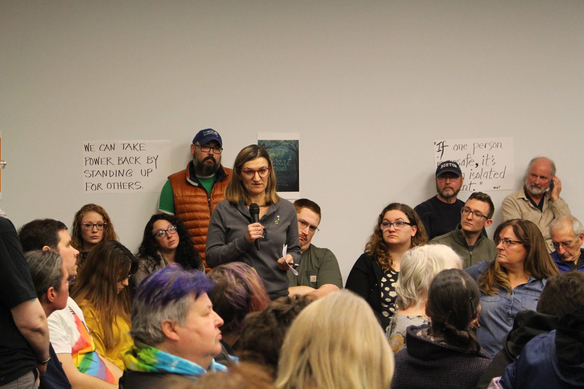 Audre Gifford asks Sen. Peter Micciche, R-Soldotna, to support SB82 during the LGBTQ Town Hall at the Soldotna Public Library in Soldotna, Alaska on Jan. 4, 2020. (Photo by Brian Mazurek/Peninsula Clarion)