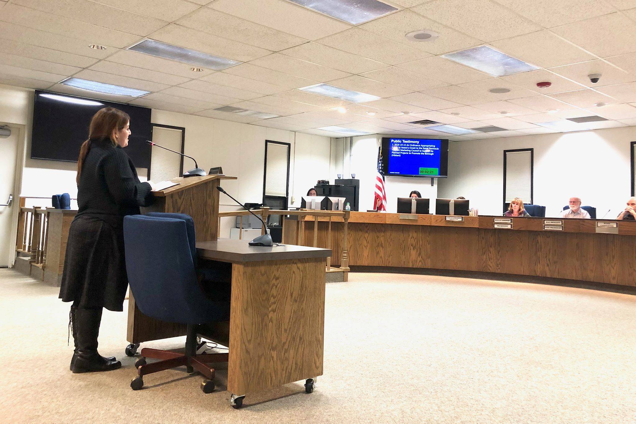 Debbie Speakman of Homer, a contracted consultant for the Kenai Peninsula Tourism Marketing Council, provides public testimony in support of an ordinance providing a $150,000 grant to the council during Tuesday’s Kenai Peninsula Borough Assembly meeting, on Nov. 5, 2019, in Soldotna, Alaska. (Photo By Victoria Petersen/Peninsula Clarion)