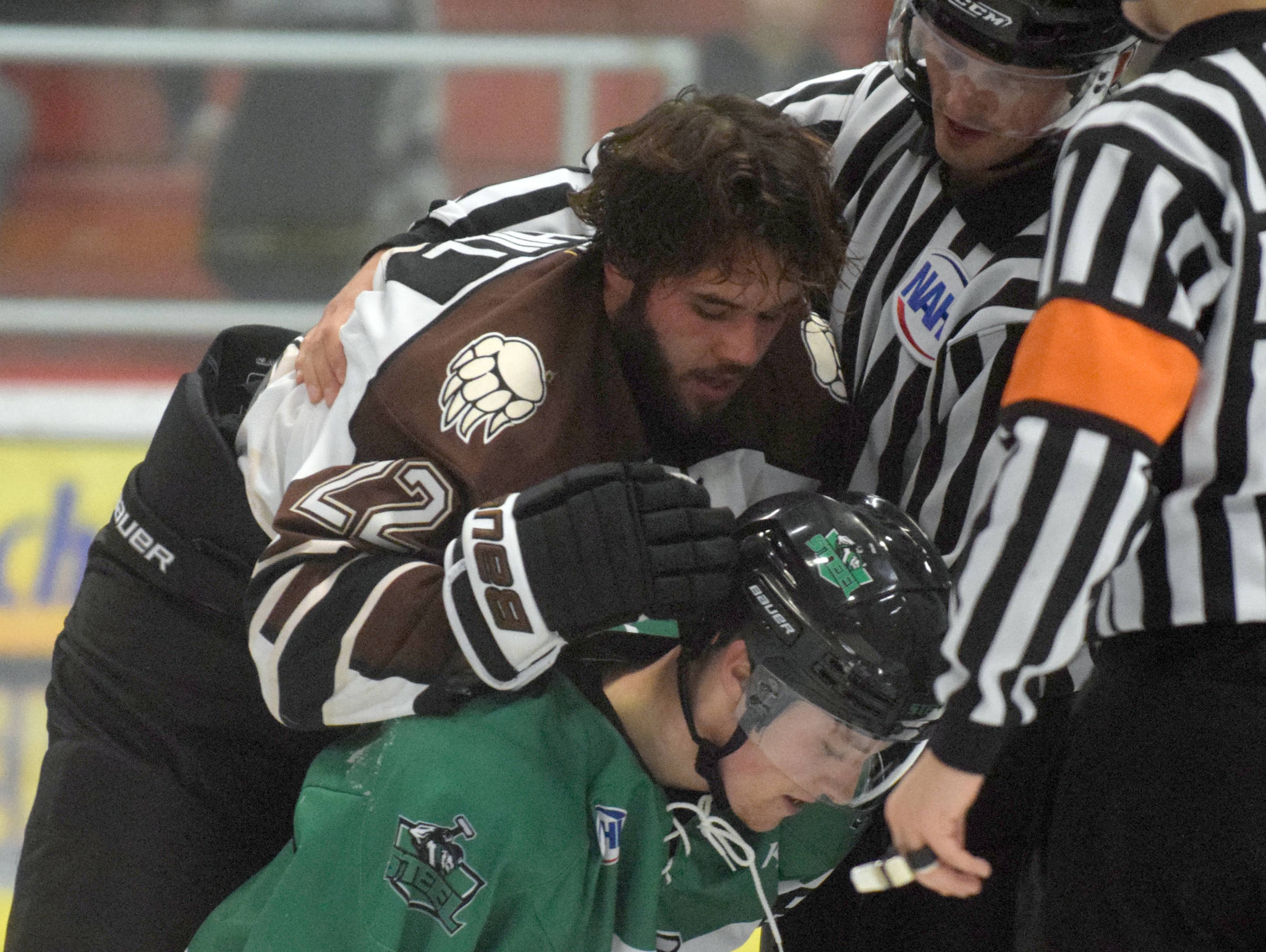 Kenai River Brown Bears defenseman Connor Scahill is involved in a brief scuffle with Jordan Gonzalez of the Chippewa (Wisconsin) Steel on Oct. 5, 2018, at the Soldotna Regional Sports Complex. (Photo by Jeff Helminiak/Peninsula Clarion)