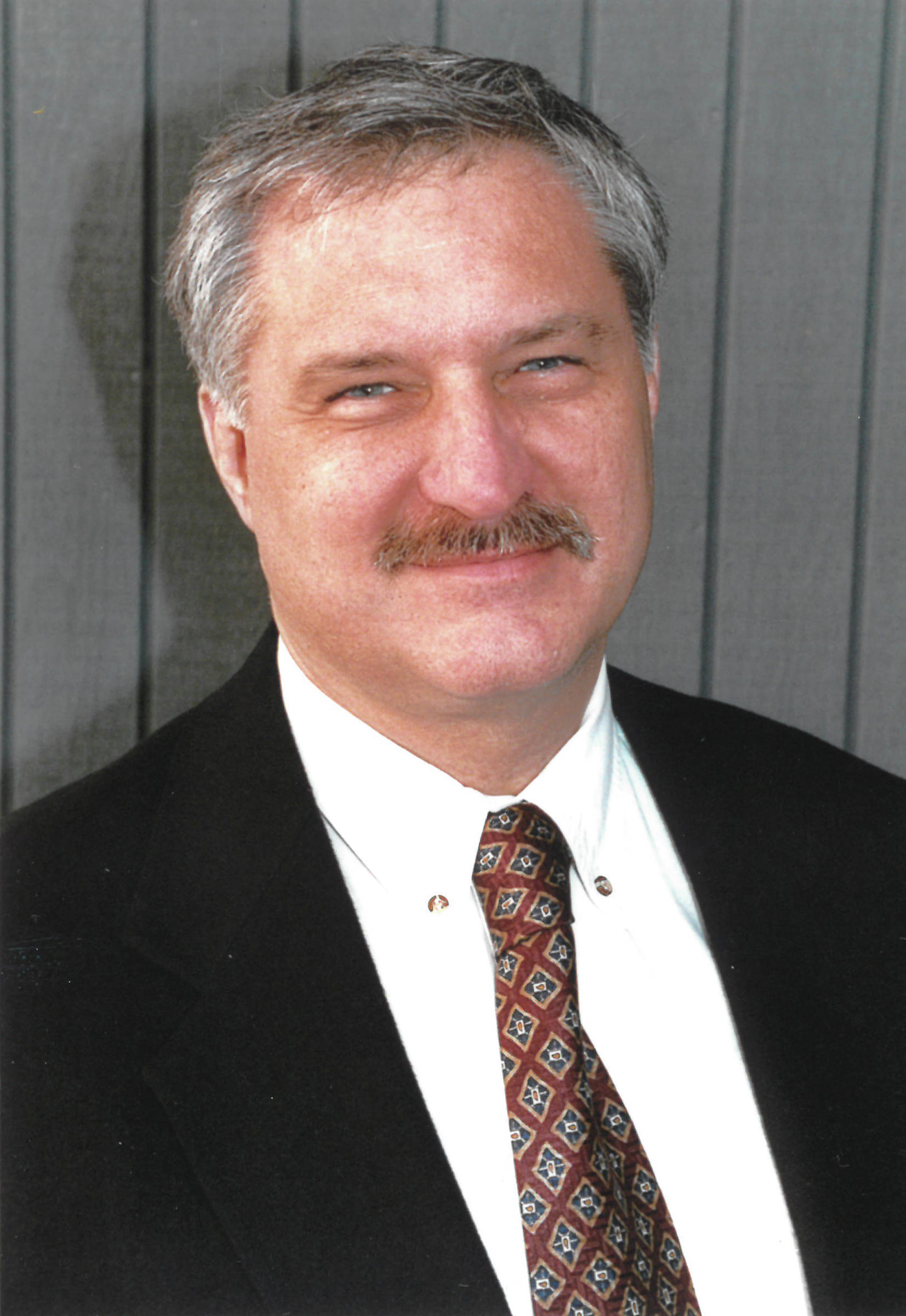 Gary Thomas in a January 2002 photo after he was promoted to Homer News editor and publisher. (Homer News file photo)