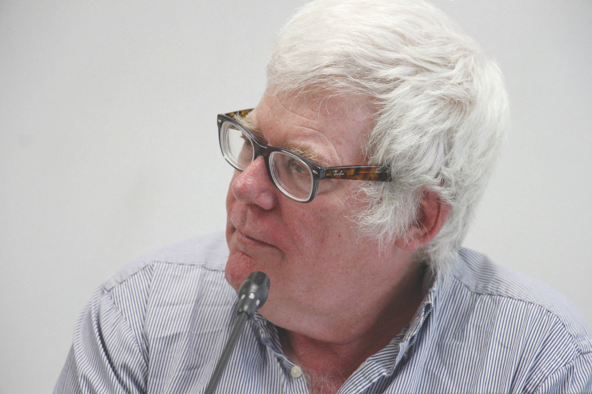 In this May 1, 2019, file photo, Alaska Marijuana Control Board chairman Mark Springer, of Bethel, listens during the board’s meeting in Anchorage. The chairman of the board that regulates legal marijuana in Alaska, who also is a critic of Gov. Mike Dunleavy, said Wednesday, he had received no advance warning that Dunleavy was replacing him. (AP Photo/Mark Thiessen, File)