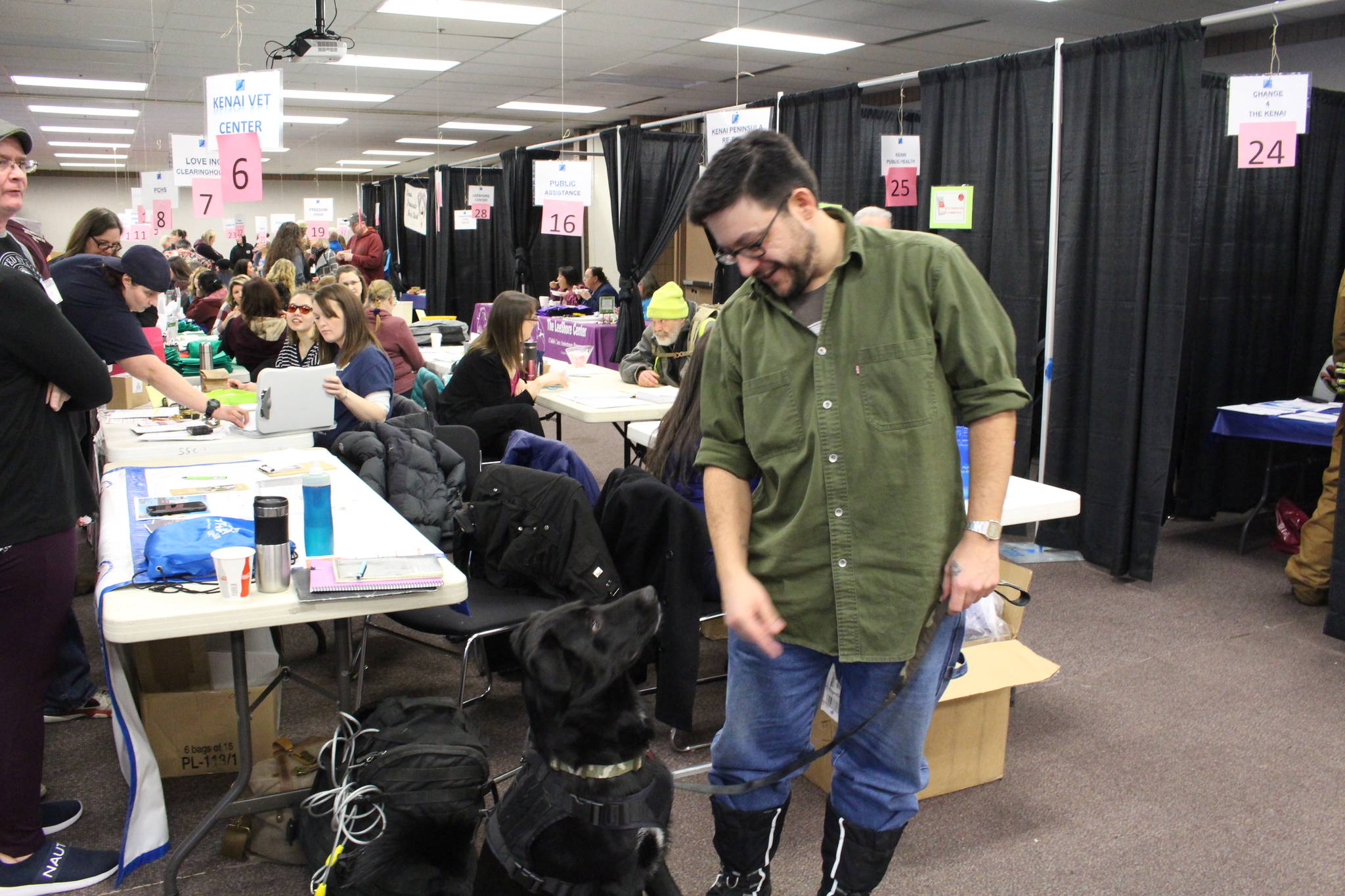 Kenneth Russell and his dog Ichabod, aka “Icky,” attend the 2020 Project Homeless Connect event at the Soldotna Regional Sports Complex in Soldotna, Alaska, on Jan. 29, 2020. (Photo by Brian Mazurek/Peninsula Clarion)