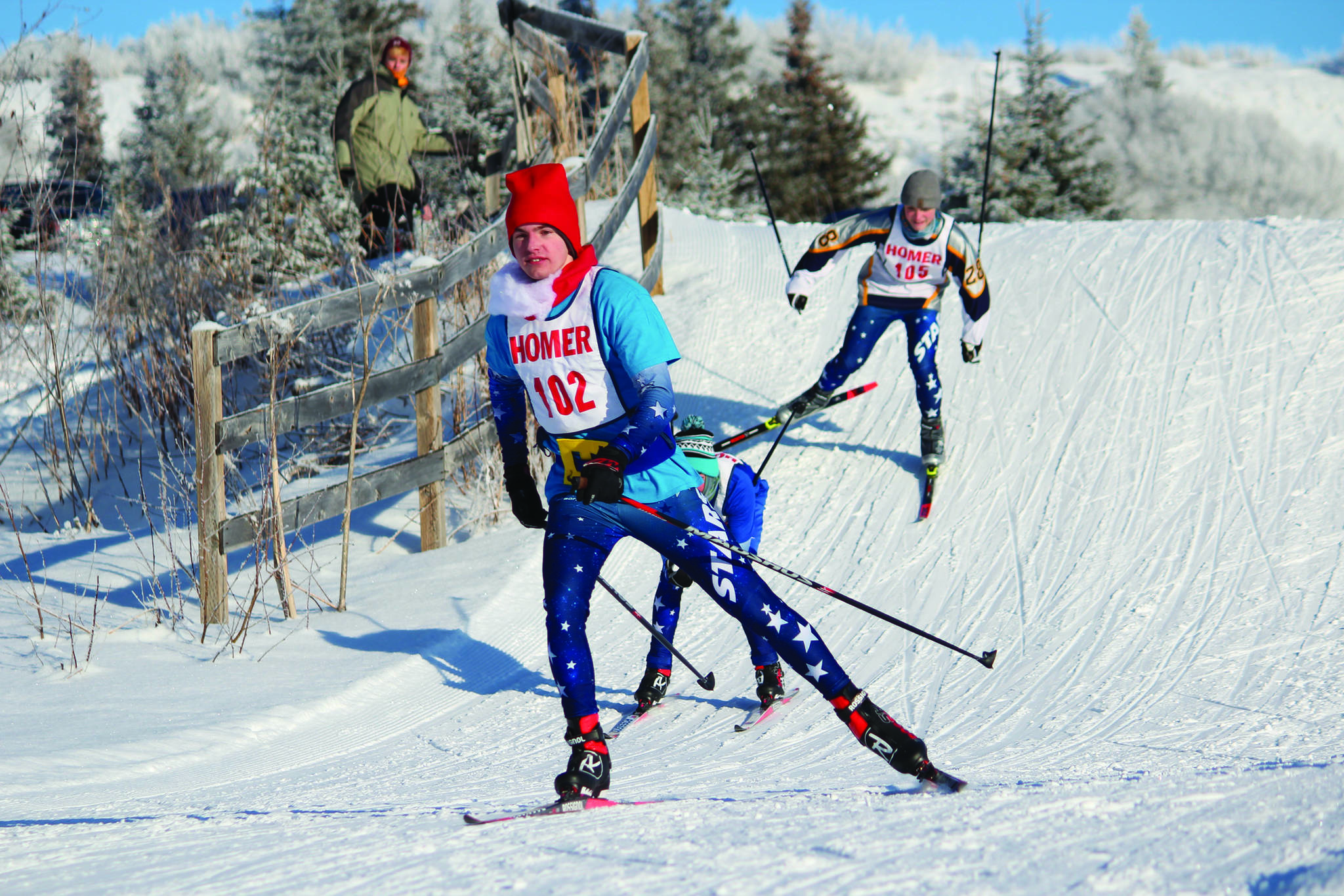 Soldotna’s Jack Harris leads a group of skiers down a hill during the boys varsity 5-kilometer skate race Saturday during the Homer Invite at the Lookout Mountain Trails on Ohlson Mountain Road near Homer. (Photo by Megan Pacer/Homer News)