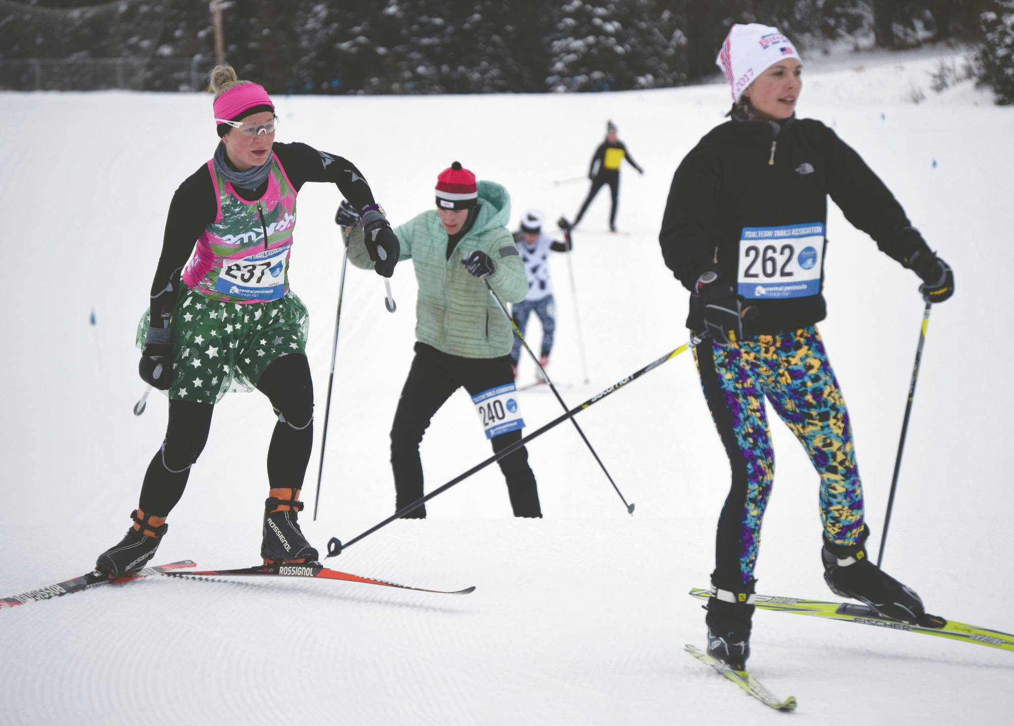 Eventual race winner Morgan Aldridge chases Libby Jensen, who finished third, and is chased by Amy Anderson, who took second, at the Ski for Women on Sunday, Feb. 2, 2020, at Tsalteshi Trails just outside of Soldotna. (Photo by Jeff Helminiak/Peninsula Clarion)