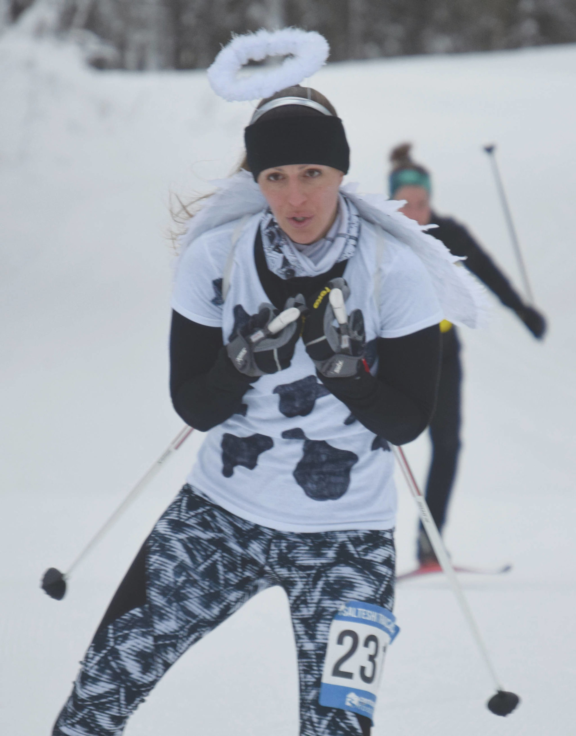 Sarah Foster competes dressed as a holy cow at the Ski for Women on Sunday, Feb. 2, 2020, at Tsalteshi Trails just outside of Soldotna, Alaska. (Photo by Jeff Helminiak/Peninsula Clarion)