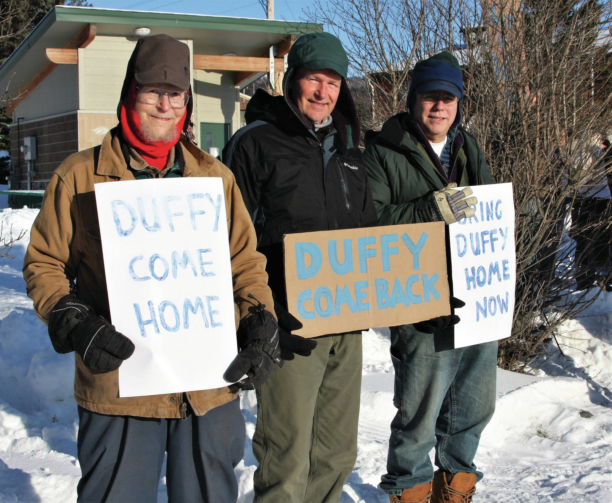 From left to right, Homer residents Tony Burgess, Neil Wagner and Charlie Trowbridge stand vigil for Anesha “Duffy” Murnane at WKFL Park on Saturday, Feb. 1, 2020, in Homer, Alaska. (Photo by Delcenia Cosman)                                From left to right, Homer residents Tony Burgess, Neil Wagner and Charlie Trowbridge stand vigil for Anesha “Duffy” Murnane at WKFL Park on Saturday, Feb. 1, 2020, in Homer, Alaska. (Photo by Delcenia Cosman)