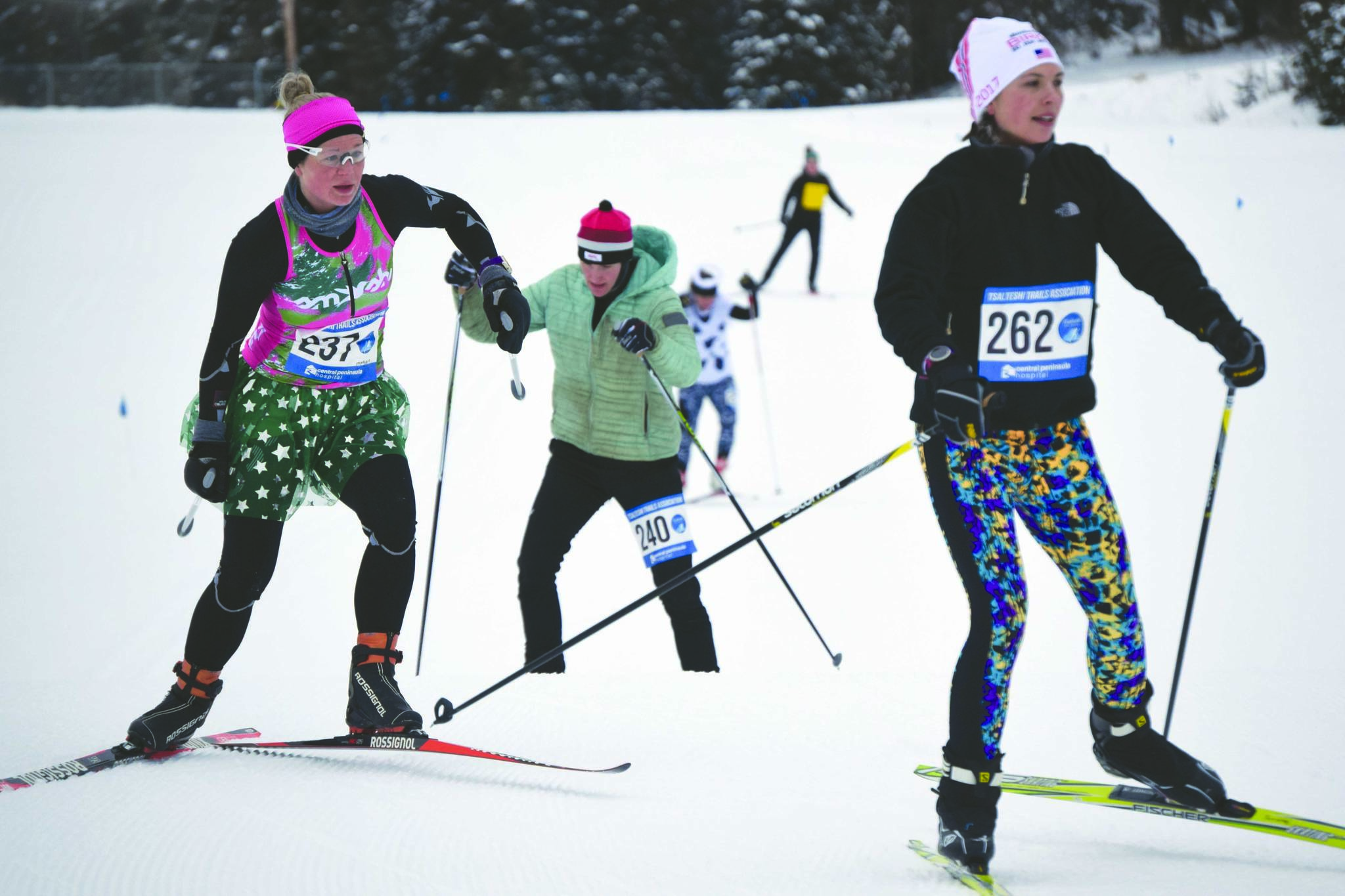 Eventual race winner Morgan Aldridge chases Libby Jensen, who finished third, and is chased by Amy Anderson, who took second, at the Ski for Women on Sunday, Feb. 2, 2020, at Tsalteshi Trails just outside of Soldotna. (Photo by Jeff Helminiak/Peninsula Clarion)