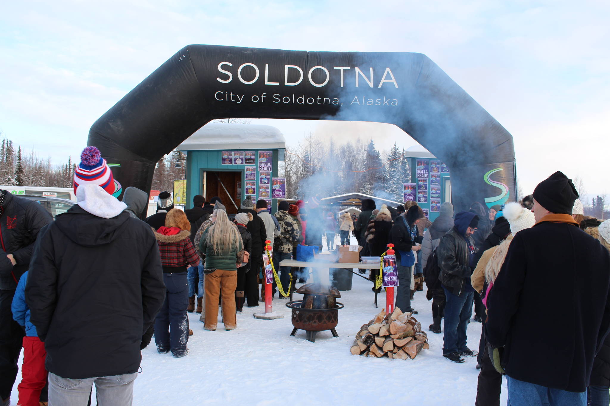 Attendees line up to get into the 2020 Frozen RiverFest at Soldotna Creek Park in Soldotna, Alaska on Feb. 15, 2020. (Photo by Brian Mazurek/Peninsula Clarion)