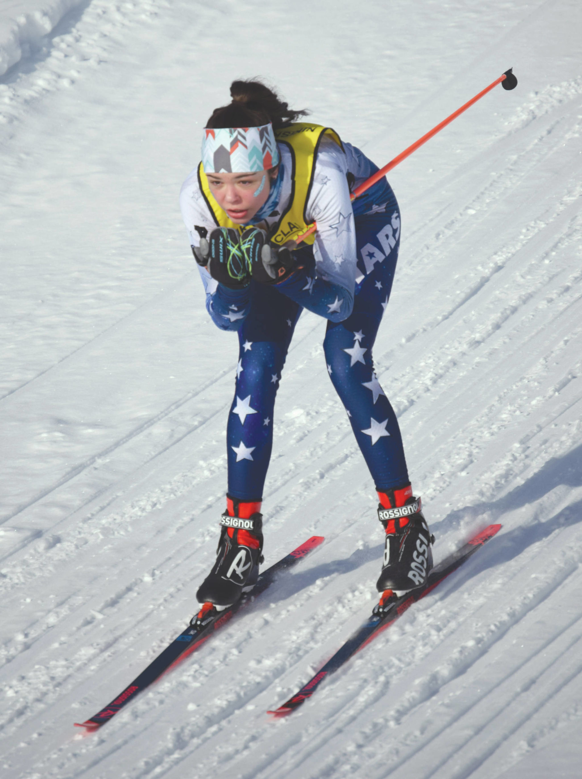 Soldotna’s Erika Arthur cruises down a hill at the Kenai Peninsula Borough Nordic ski championships Saturday, Feb. 15, 2020, at Tsalteshi Trails just outside of Soldotna, Alaska. (Photo by Jeff Helminiak/Peninsula Clarion)