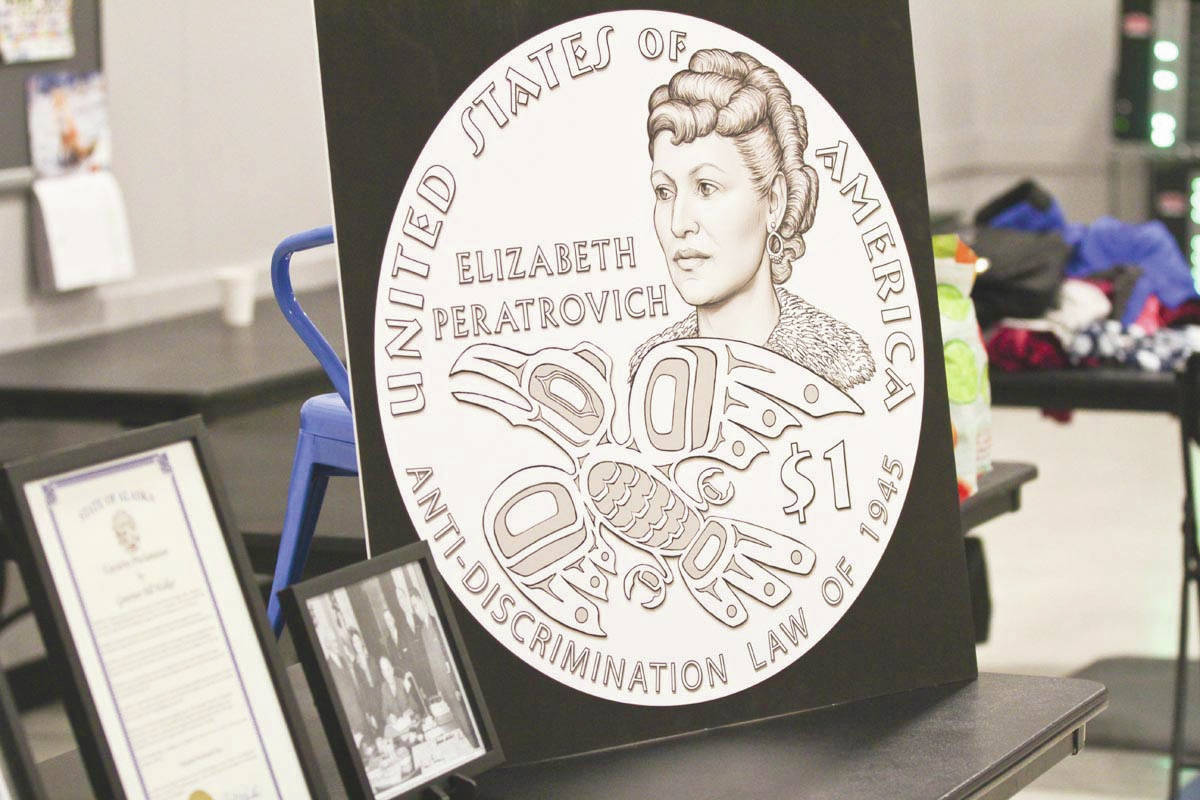 The design for the new gold $1 Elizabeth Peratrovich coin was on display during the Elizabeth Peratrovich Day celebration at the Tlingit and Haida Community Council on Feb. 16, 2020. (Michael S. Lockett | Juneau Empire)