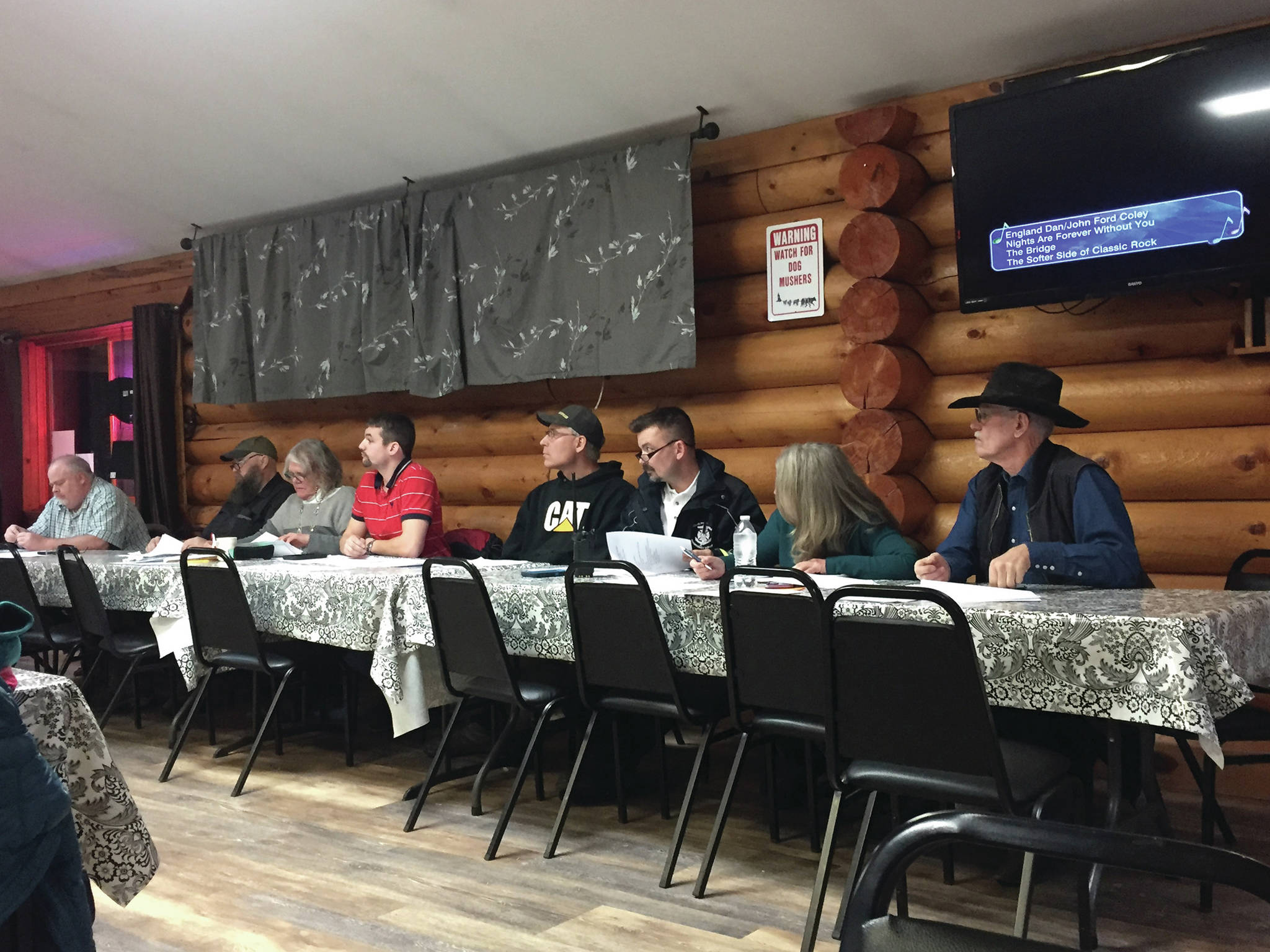 From left to right, Kenai Peninsula Borough Planning Department liaison Bruce Wall, Chris Platter, Anchor Point Advisory Planning Commission secretary Donna White, Anchor Point APC chair Dawson Slaughter, Brok Shafer, Jon Marsh, Chris Crum, and Anchor Point APC vice chair Ray Drake hear public testimony regarding Beachcomber LLC owners Emmitt and Mary Trimble’s application to extend their gravel pit during the Anchor Point Advisory Planning Commission Meeting on Thursday, Feb. 13, 2020, at the Anchor Point Senior Center in Anchor Point, Alaska. (Photo by Delcenia Cosman)