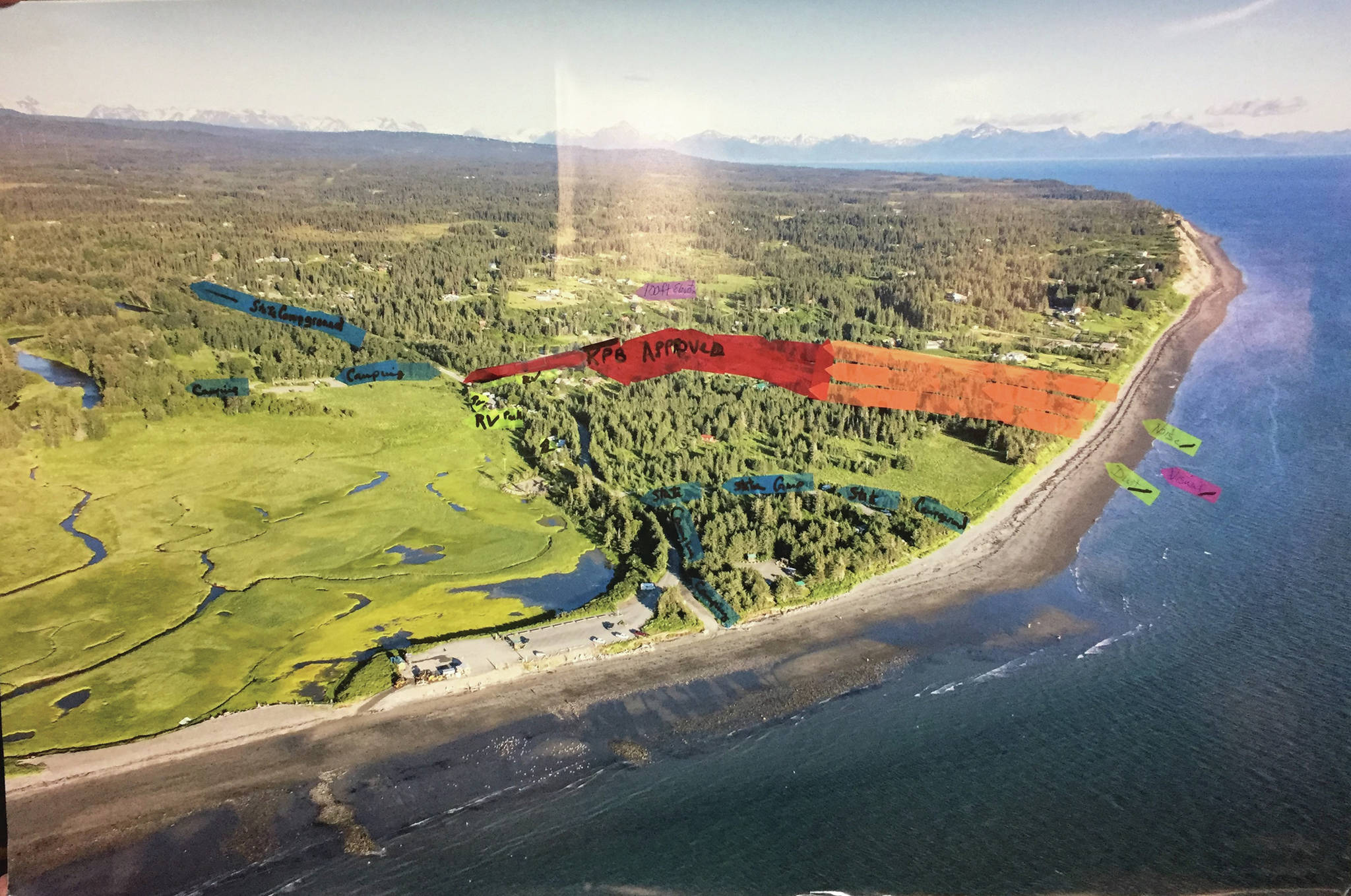 A diagram presented by Teresa Jacobson Gregory illustrates the proposed extension of the Trimbles’ gravel pit and the impact it may have on the surrounding state recreation area. The red markers indicate the current gravel mining area, and the orange represents the area the extension may allow for mining if approved. (Image courtesy Teresa Jacobson Gregory)