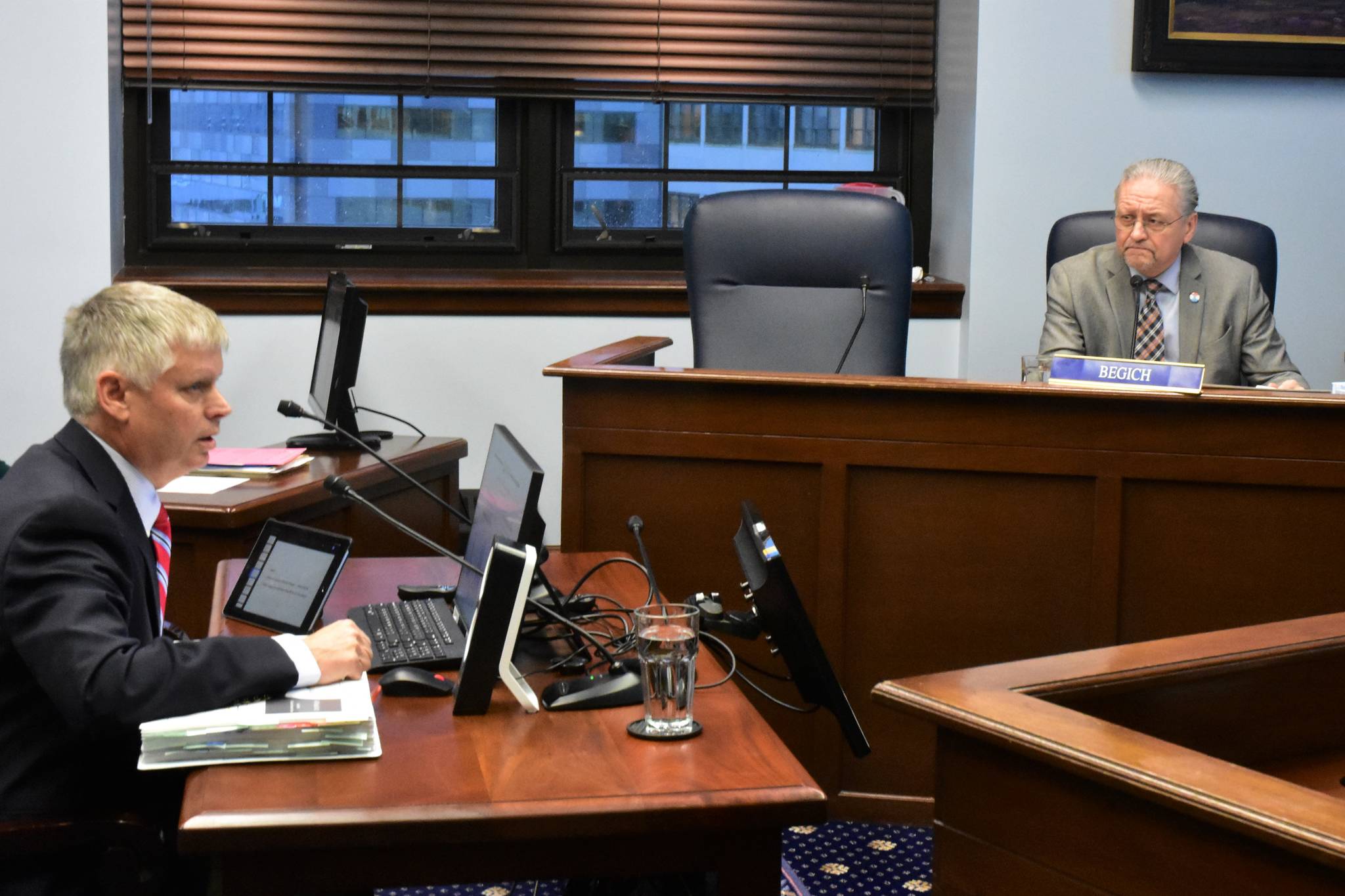 Bob Griffin, senior education research fellow from the Alaska Policy Forum, left, and Sen. Tom Begich, D-Anchorage, at a Senate Education Committee meeting on Tuesday, Feb. 4, in Juneau. (Peter Segall | Juneau Empire)