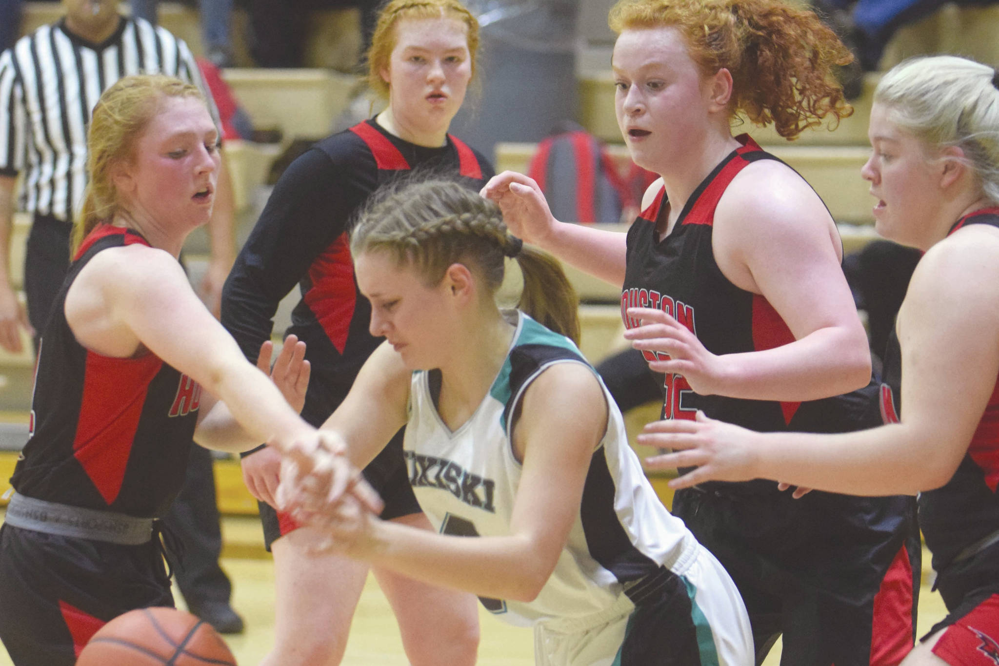 Nikiski girls, Houston boys get conference wins