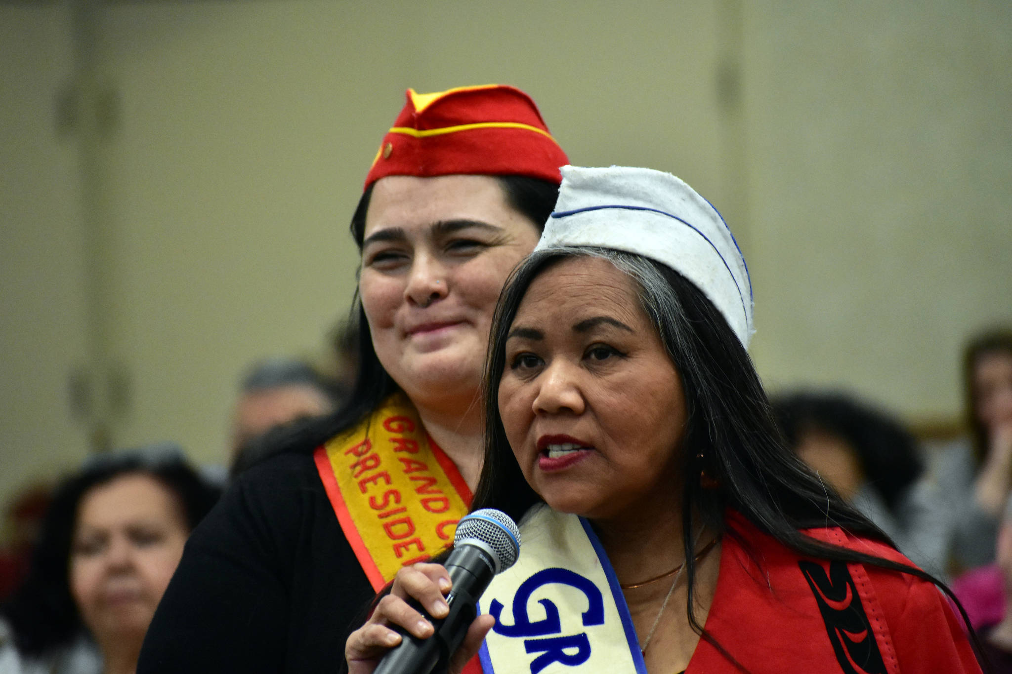 Peter Segall | Juneau Empire                                Alaska Native Sisterhood Grand President Paulette Moreno (front) speaks at the Alaska Native Issues Forum with Alaska Native Brotherhood Grand President Heather Gurko on Monday.