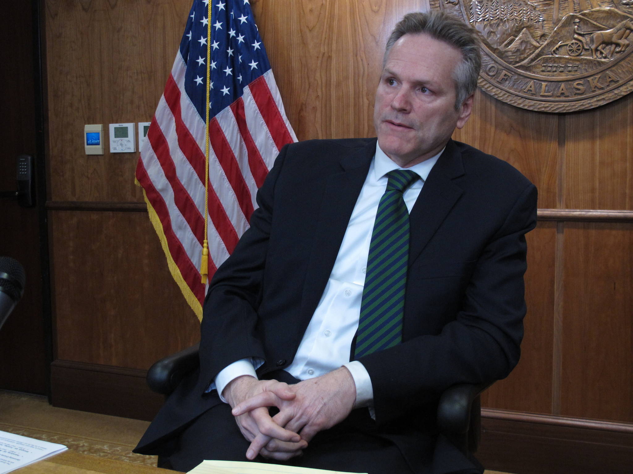 In this Jan. 31, 2020 photo, Alaska Gov. Mike Dunleavy speaks to reporters in Juneau, Alaska. On Wednesday, Feb. 12, Dunleavy proposed a state lottery as a way to provide a new source of revenue. (AP Photo/Becky Bohrer)