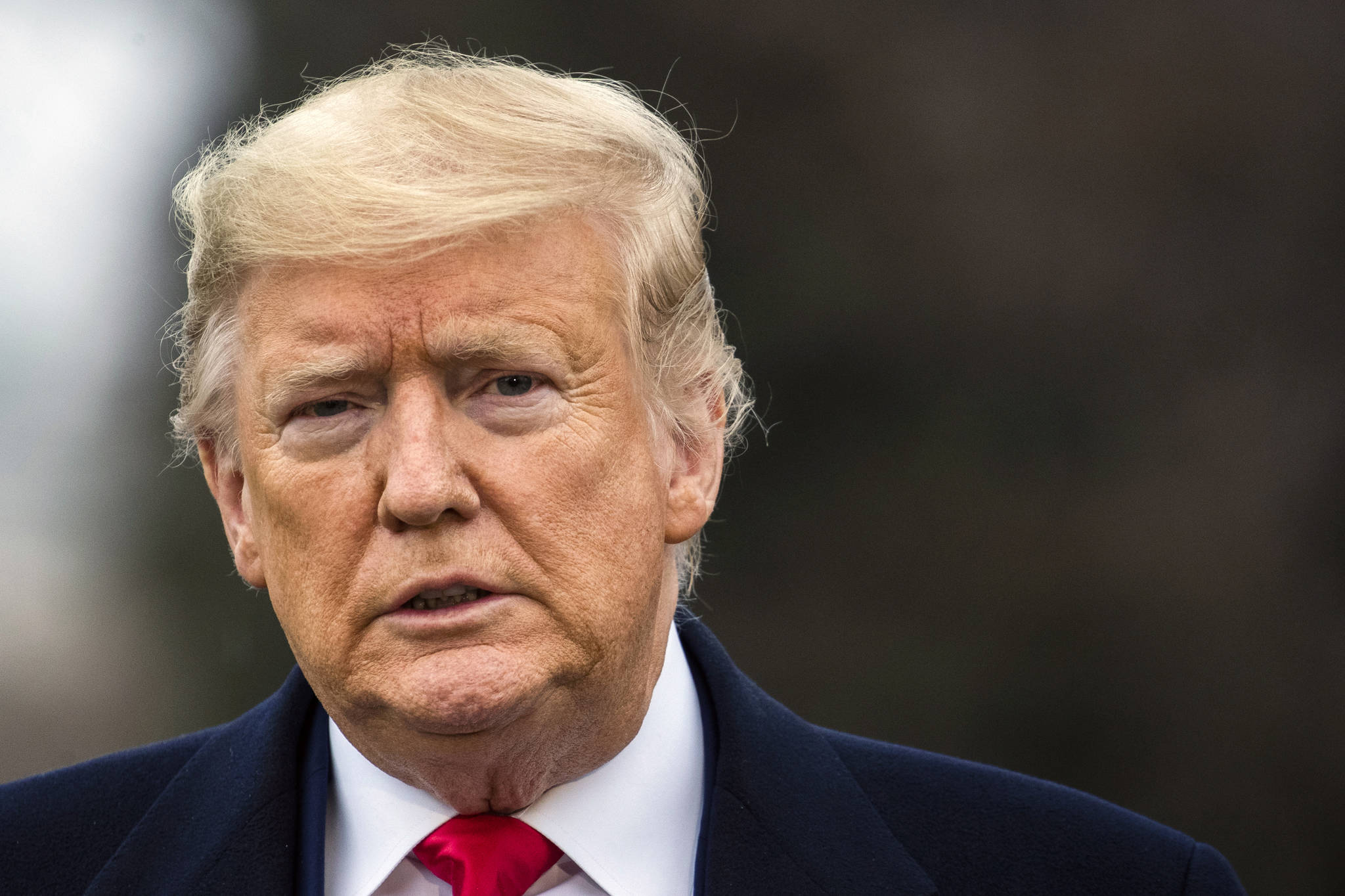 President Donald Trump talks to members of the media before leaving the White House, Monday, March 2, 2020 in Washington, to attend a campaign rally in Charlotte, N.C. (AP Photo/Manuel Balce Ceneta)