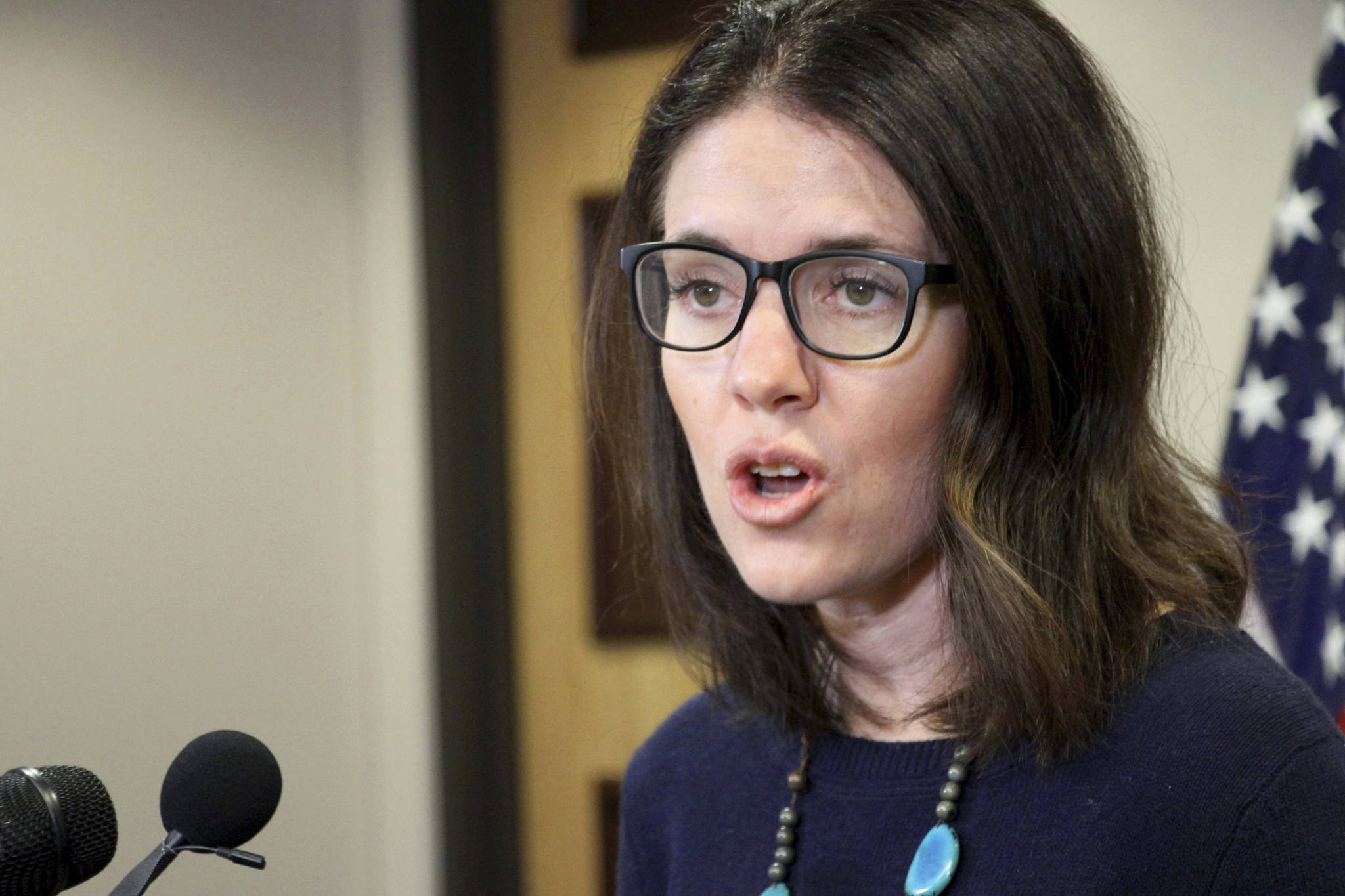 Dr. Anne Zink, the chief medical officer for the state of Alaska, addresses reporters at a news conference Monday in Anchorage. (AP Photo/Mark Thiessen)