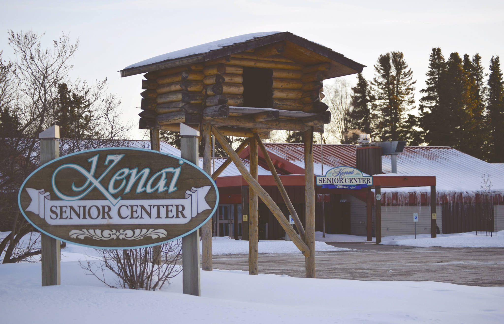 The parking lot of the Kenai Senior Center sits vacant Saturday, March 14, 2020, in Kenai, Alaska. Senior centers across the state are taking extra steps to slow the spread of the new coronavirus. (Photo by Jeff Helminiak/Peninsula Clarion)