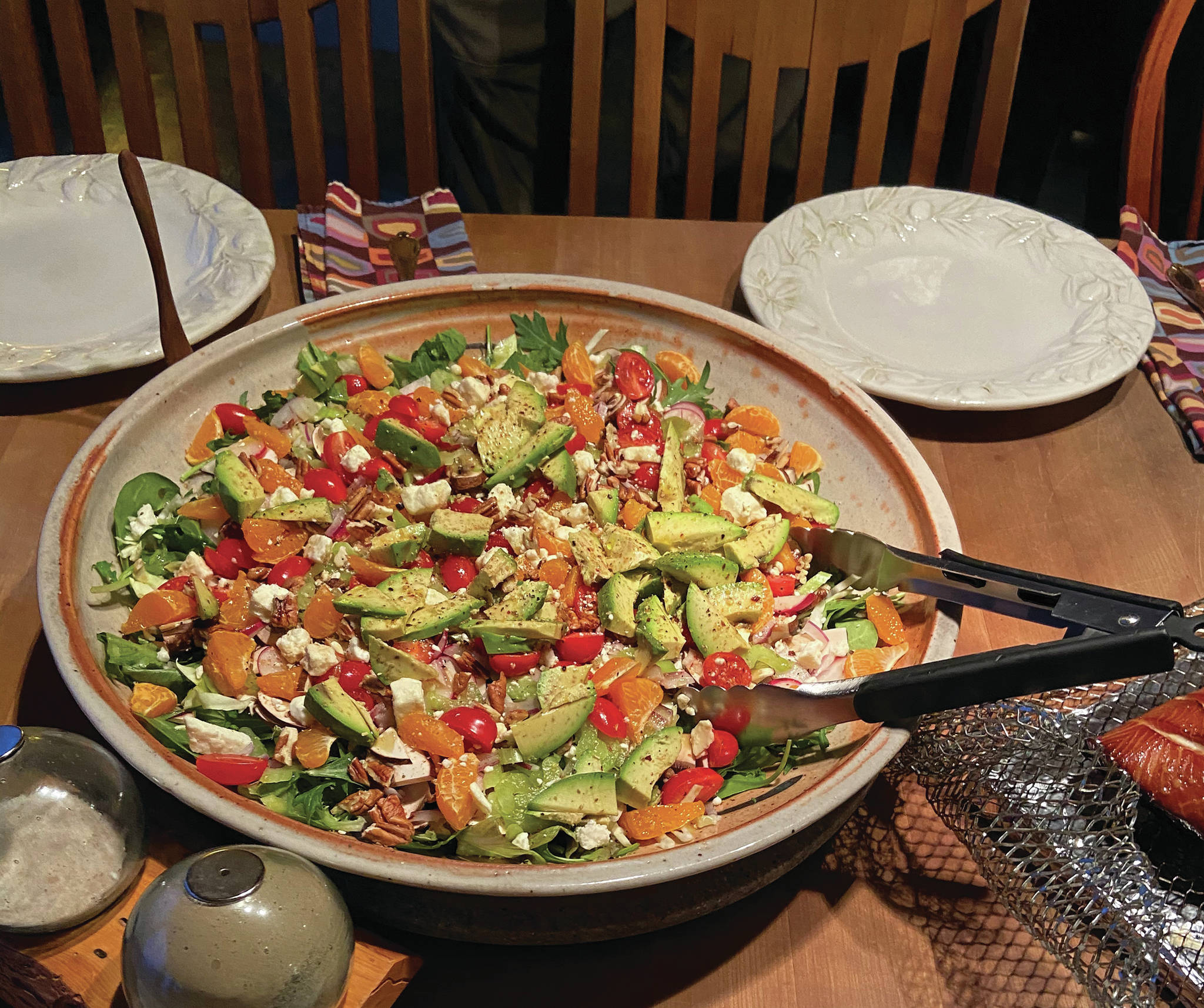 Susan Alvarez made Teri Robl’s strawberry baby spinach and romaine salad with warm citrus shallot vinaigrette on Feb. 7, 2020, at Alvarez’s home in Homer, Alaska. (Photo by Teri Robl)