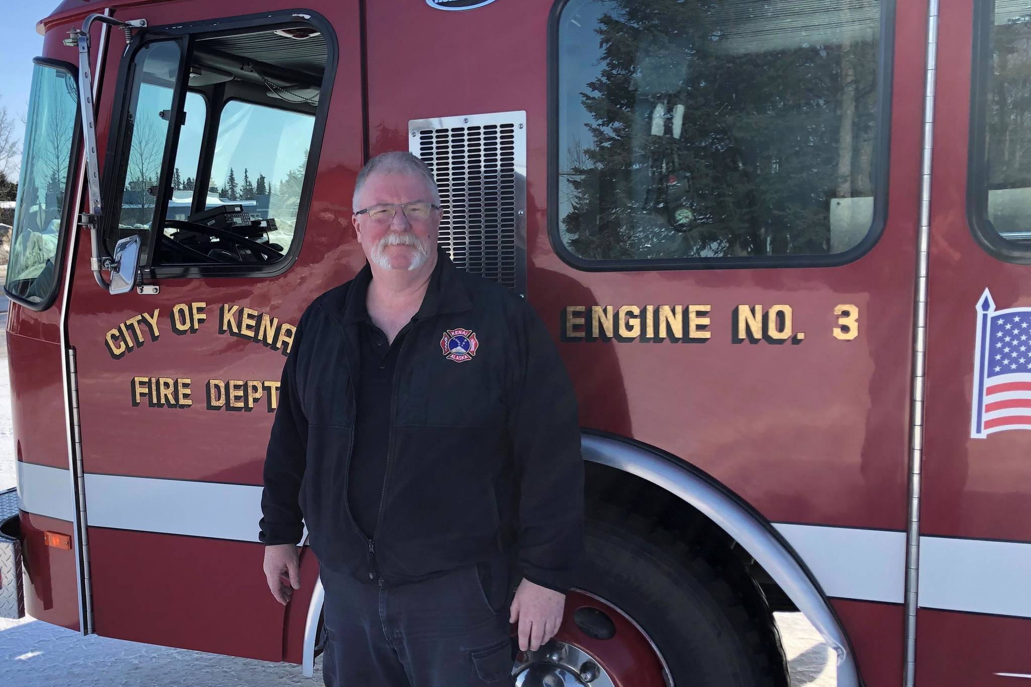 Photo courtesy Jeff Tucker                                Kenai Fire Chief Jeff Tucker, now retired, is photographed in front of the Kenai Fire Department on Friday.