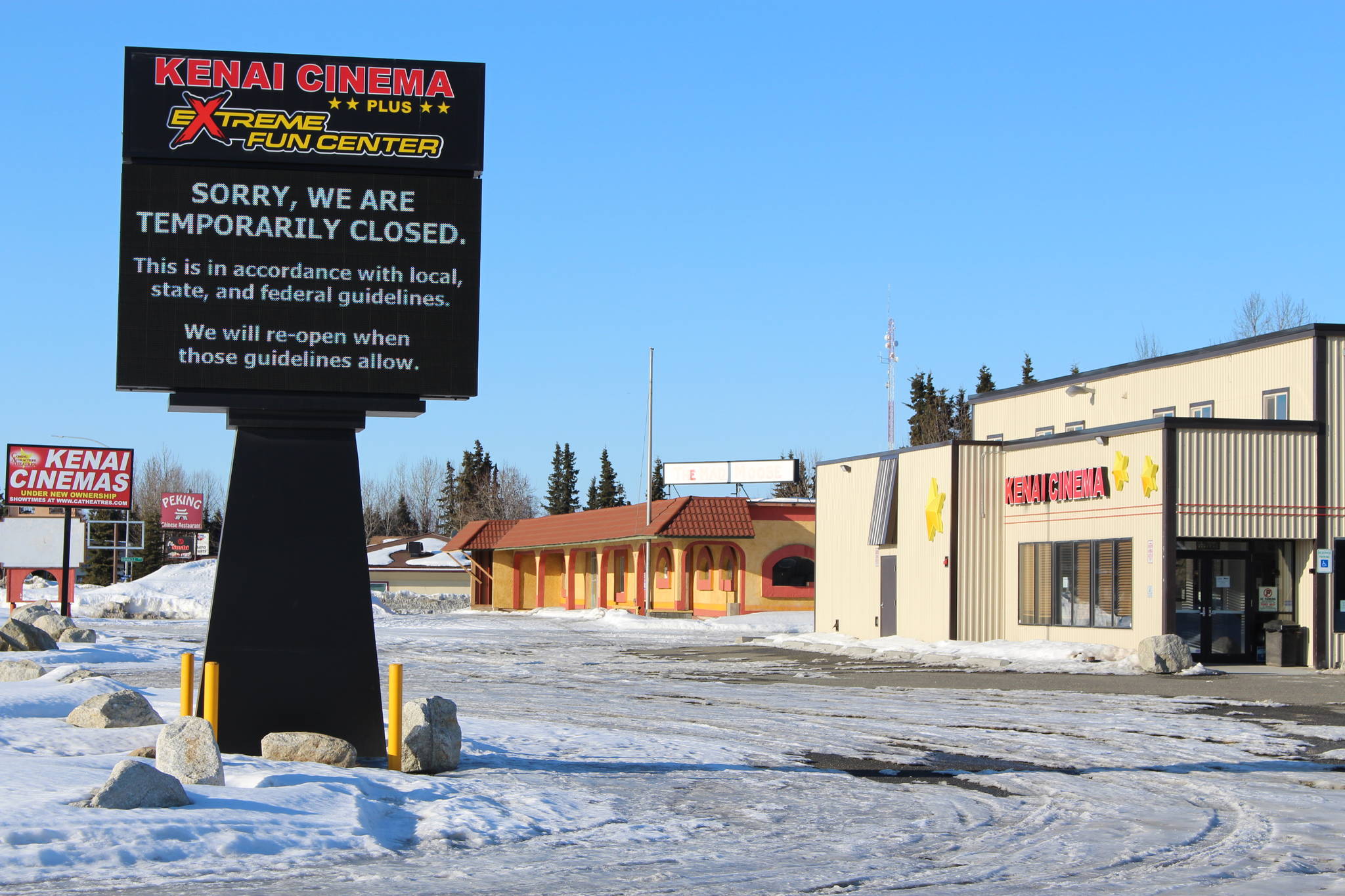 The sign outside of the Kenai Cinema and Extreme Fun Center can be seen here in Kenai, Alaska, on March 28, 2020. (Photo by Brian Mazurek/Peninsula Clarion)
