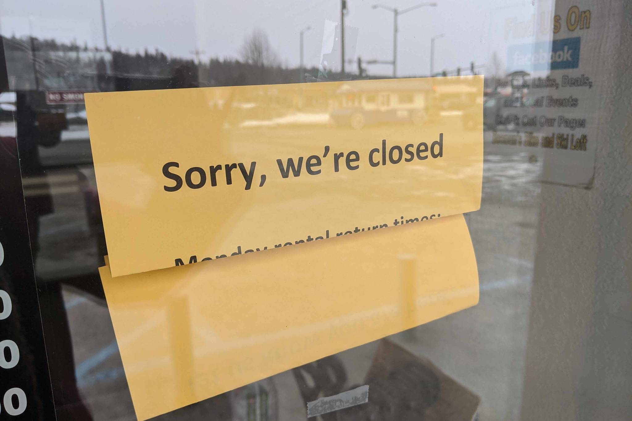 A closed sign is posted at a retail store shuttered due to the new coronavirus, in Soldotna, Alaska, on Wednesday, April 1, 2020. (Photo by Erin Thompson/Peninsula Clarion)