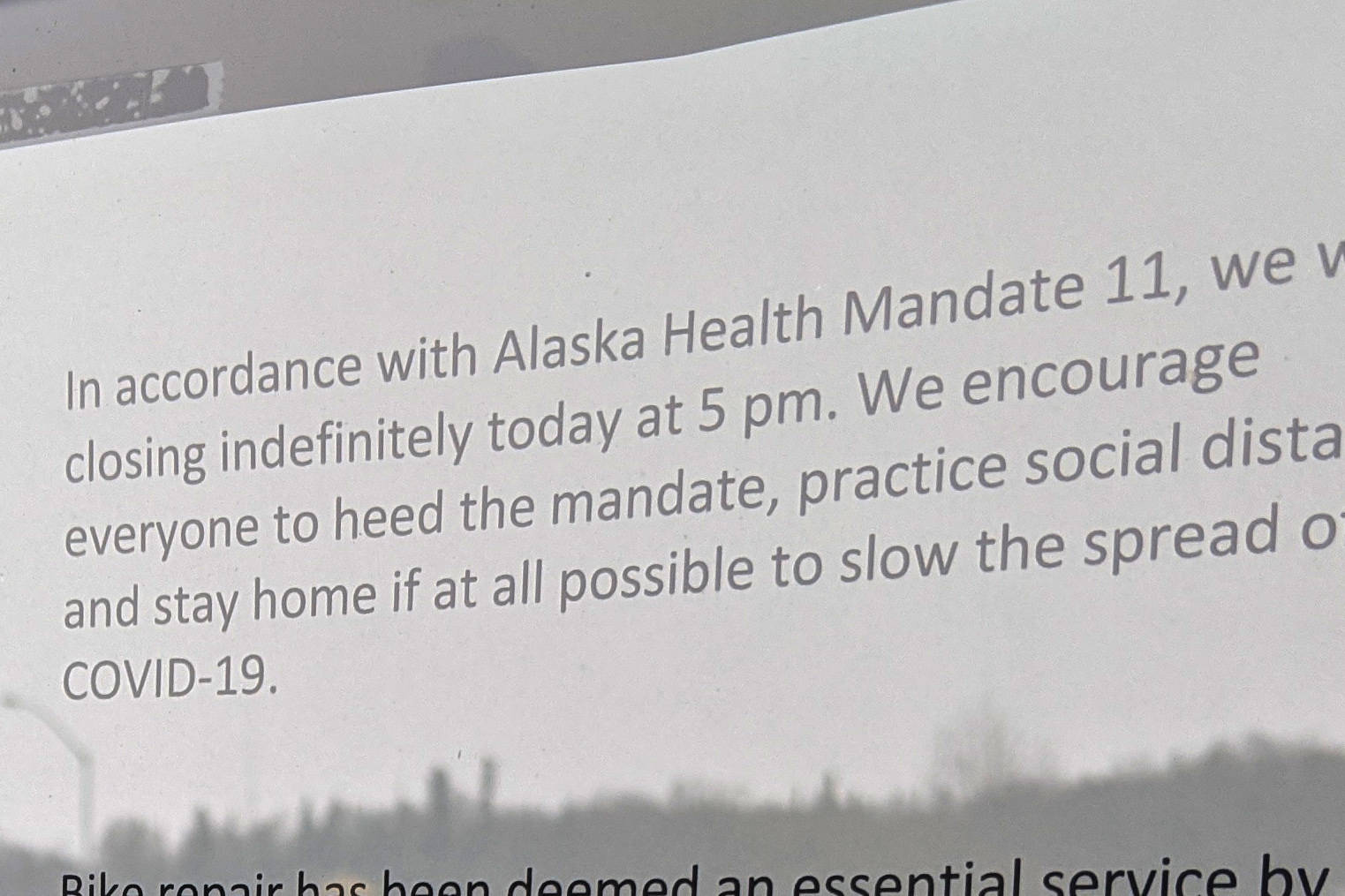 A sign notifying the public of closure of nonessential businesses due to public health mandate 11 can be seen in Soldotna, Alaska, on April 1, 2020. Gov. Mike Dunleavy issued guidelines allowing nonessential businesses to operate in a limited capacity on Wednesday, April 22, 2020. (Photo by Erin Thompson/Peninsula Clarion)