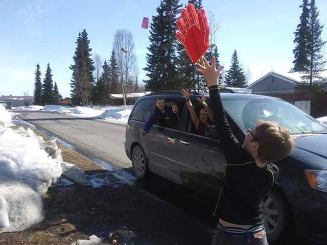 Mason McMilin celebrating his eighth birthday with no-touch high fives and a drive-by birthday in Soldotna, Alaska, on April 10, 2020. (Photo courtesy of Kim McMilin)