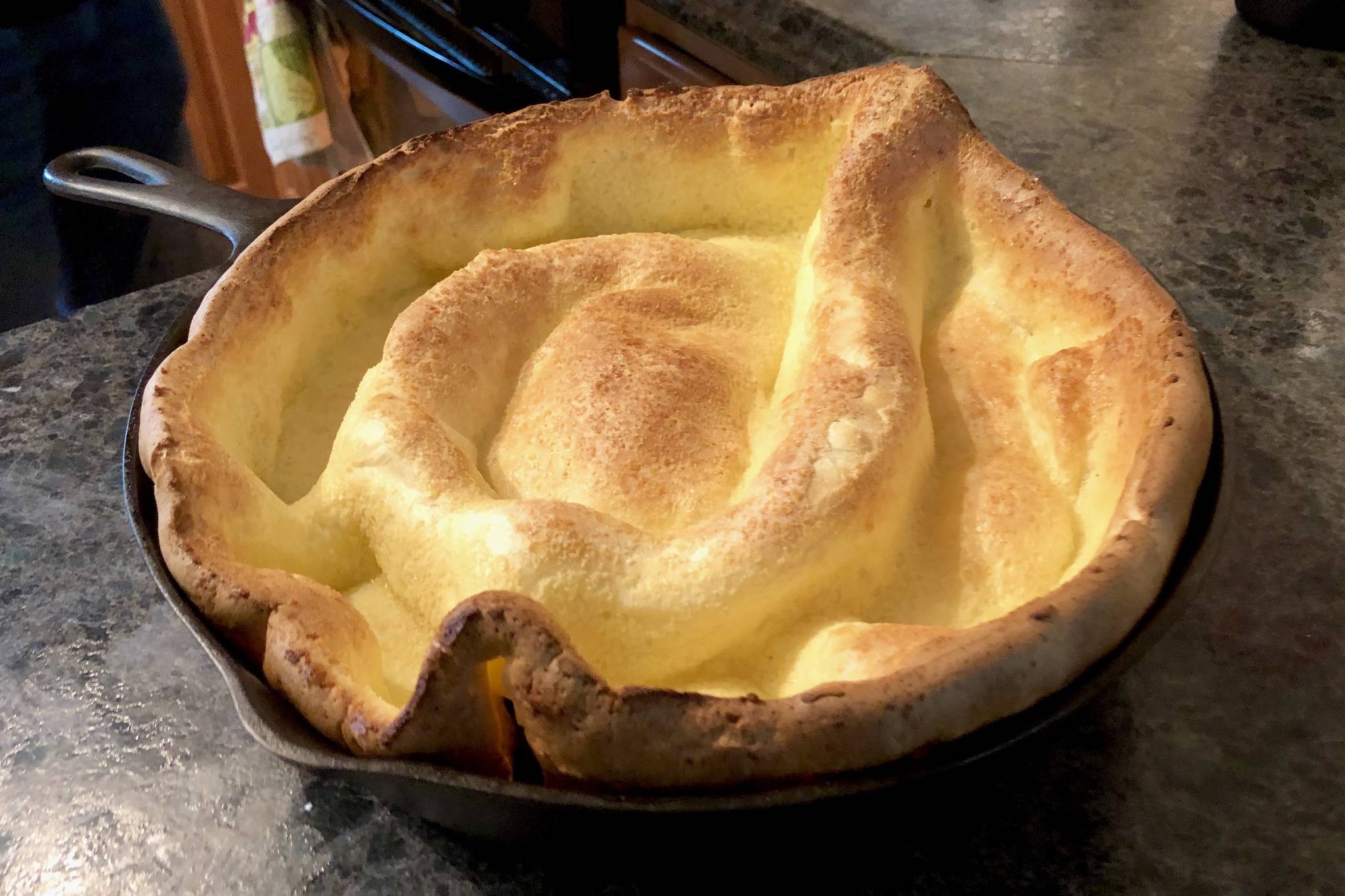 Dutch babies, golden, eggy, puffy pancakes most often baked in a cast-iron skillet, can be paired with sweet or savory ingredients. (Photo by Victoria Petersen/Peninsula Clarion)