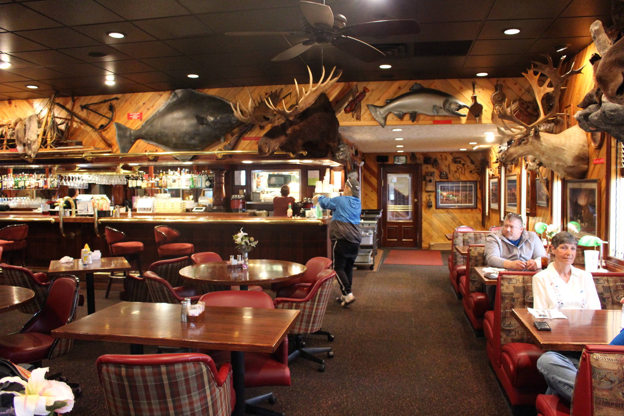 Kenai Peninsula residents eat inside Louie’s Restaurant in Kenai, Alaska on May 8, 2020. Friday was the first day that restaurants around the state began opening for dine-in services without the need for a reservation. (Photo by Brian Mazurek/Peninsula Clarion)