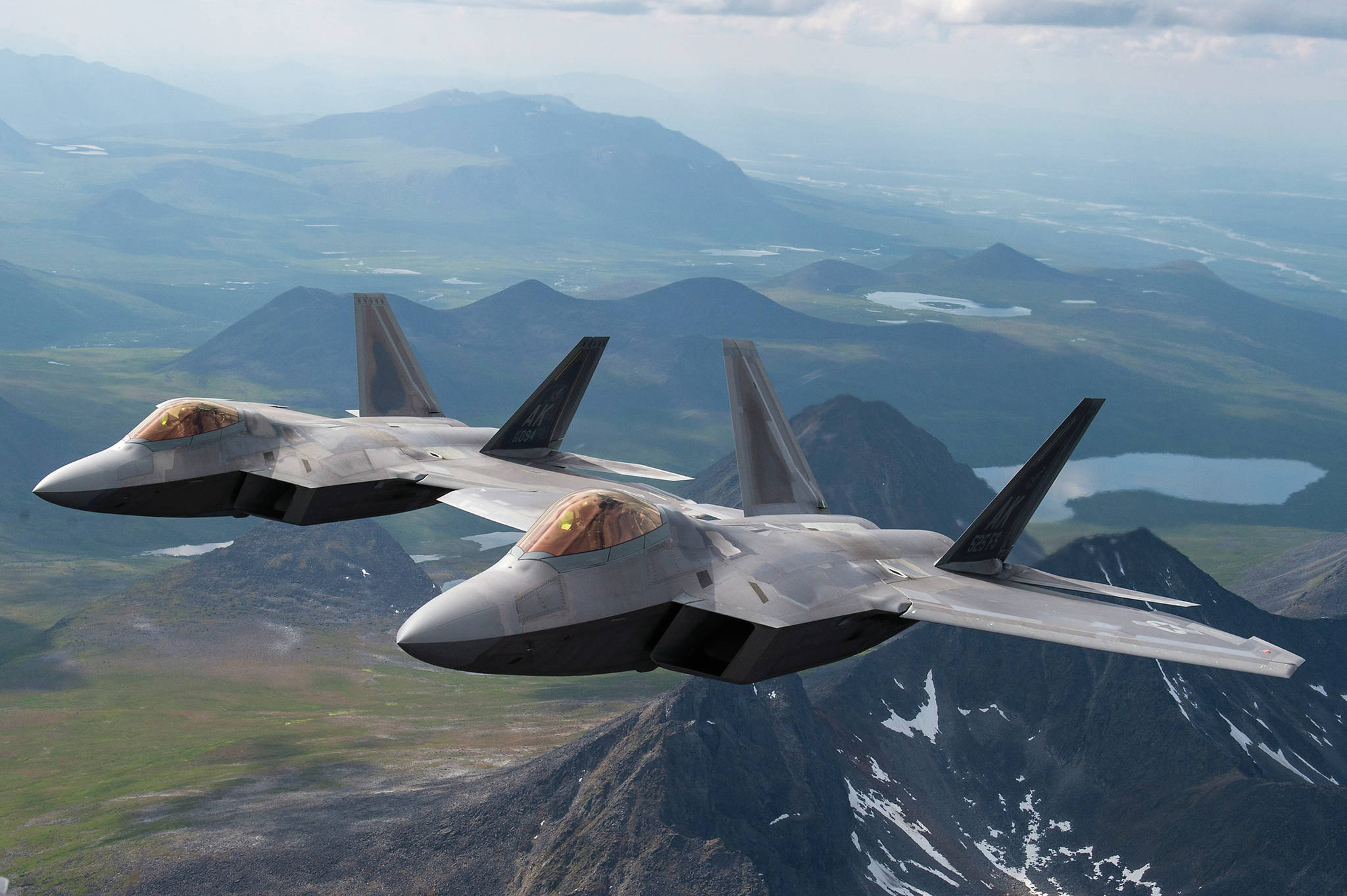 U.S. Air Force F-22 Raptors from Joint Base Elmendorf-Richardson, fly in formation over the Joint Pacific Alaska Range Complex on July 18, 2019. (U.S. Air Force photo by Staff Sgt. James Richardson)