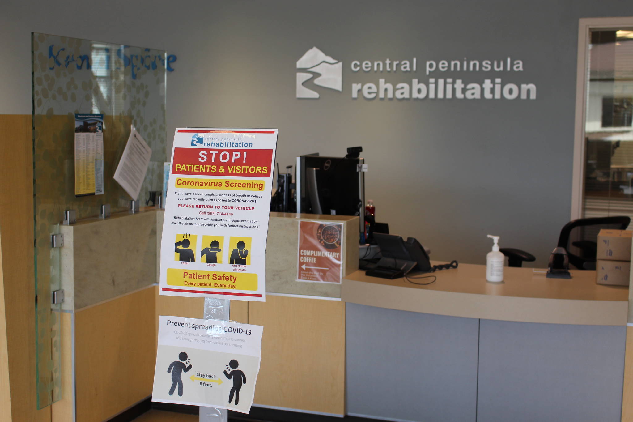 A sign instructing patients and visitors on the COVID-19 screening process is seen in the River Tower of Central Peninsula Hospital in Soldotna, Alaska, on April 7, 2020. (Photo by Brian Mazurek/Peninsula Clarion)