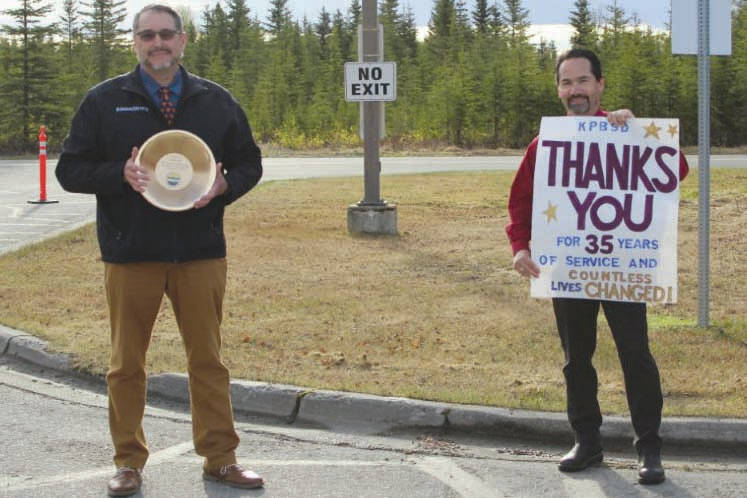 Mountain View Elementary teacher David Daniel is congratulated on his retirement by John O’Brien, Kenai Peninsula Borough School District superintendent, Tuesday, May 19, 2020, at Mountain View in Kenai. Daniel taught in the district for 34 years. (Photo courtesy of Karl Kircher)