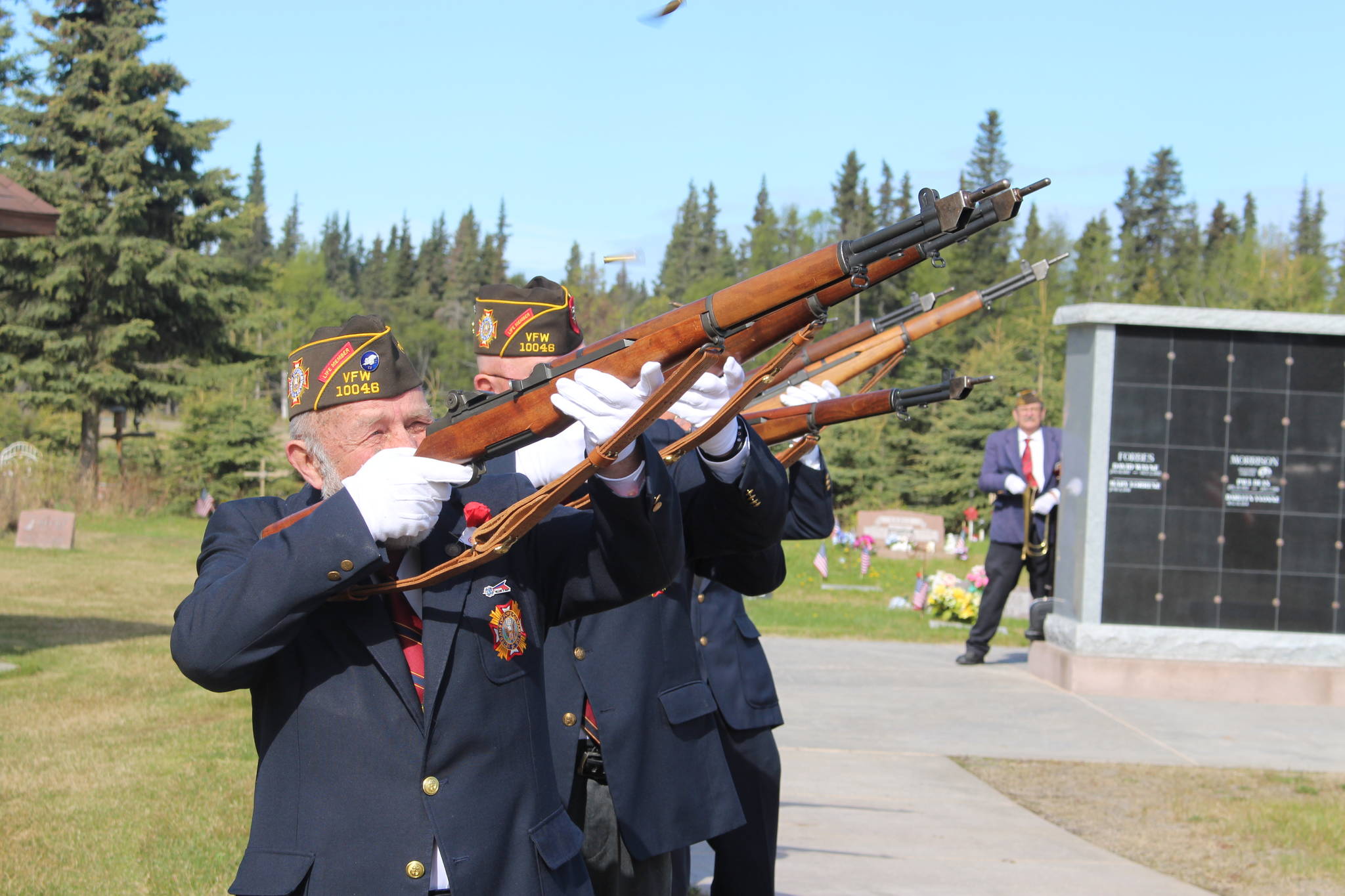 Kenai VFW Commander Mitch Johnson and members of the local VFW Honor Guard give a 21-gun salute during the Memorial Day ceremony at the Kenai Cemetery on May 25, 2020. (Photo by Brian Mazurek/Peninsula Clarion)