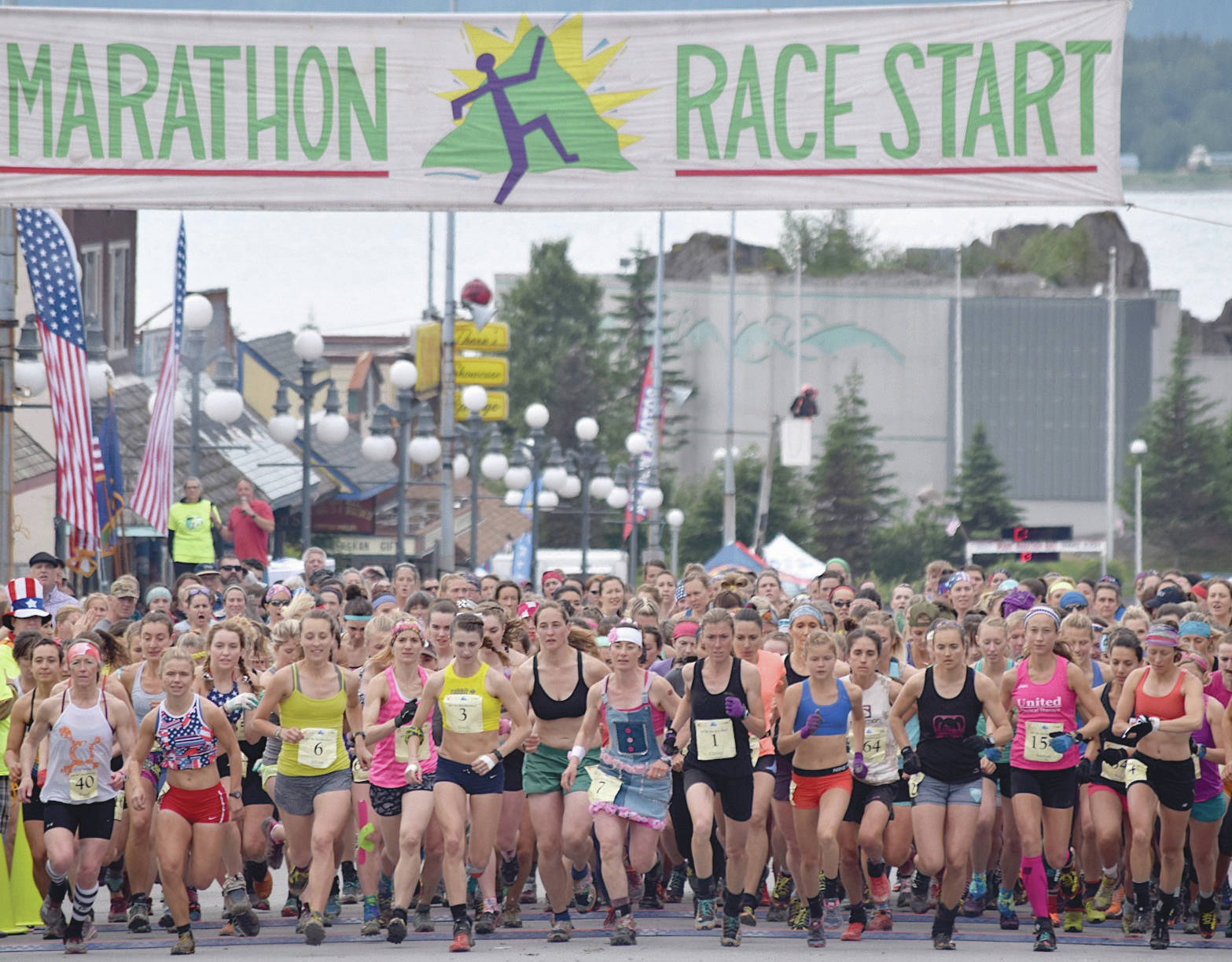 Jeff Helminiak / Peninsula Clarion                                 The women’s field takes to the course Tuesday, July 4, 2017, at the Mount Marathon Race in Seward. Eventual winner Allie Ostrander is to the right of Christy Marvin (1).