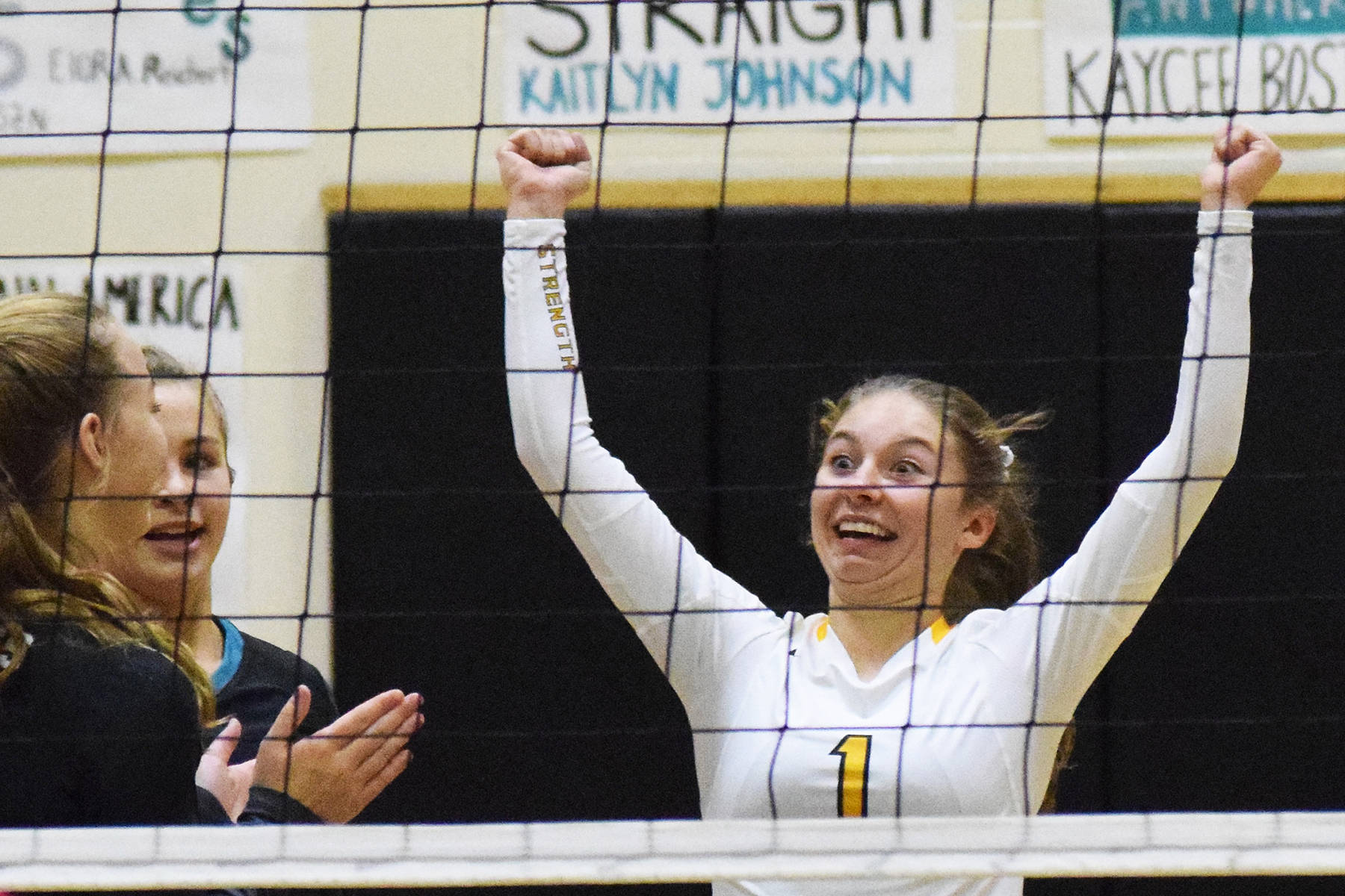 Nikiski’s America Jeffreys celebrates a point with her team Friday, Sept. 27, 2019, against ACS at Nikiski High School. (Photo by Joey Klecka/Peninsula Clarion)