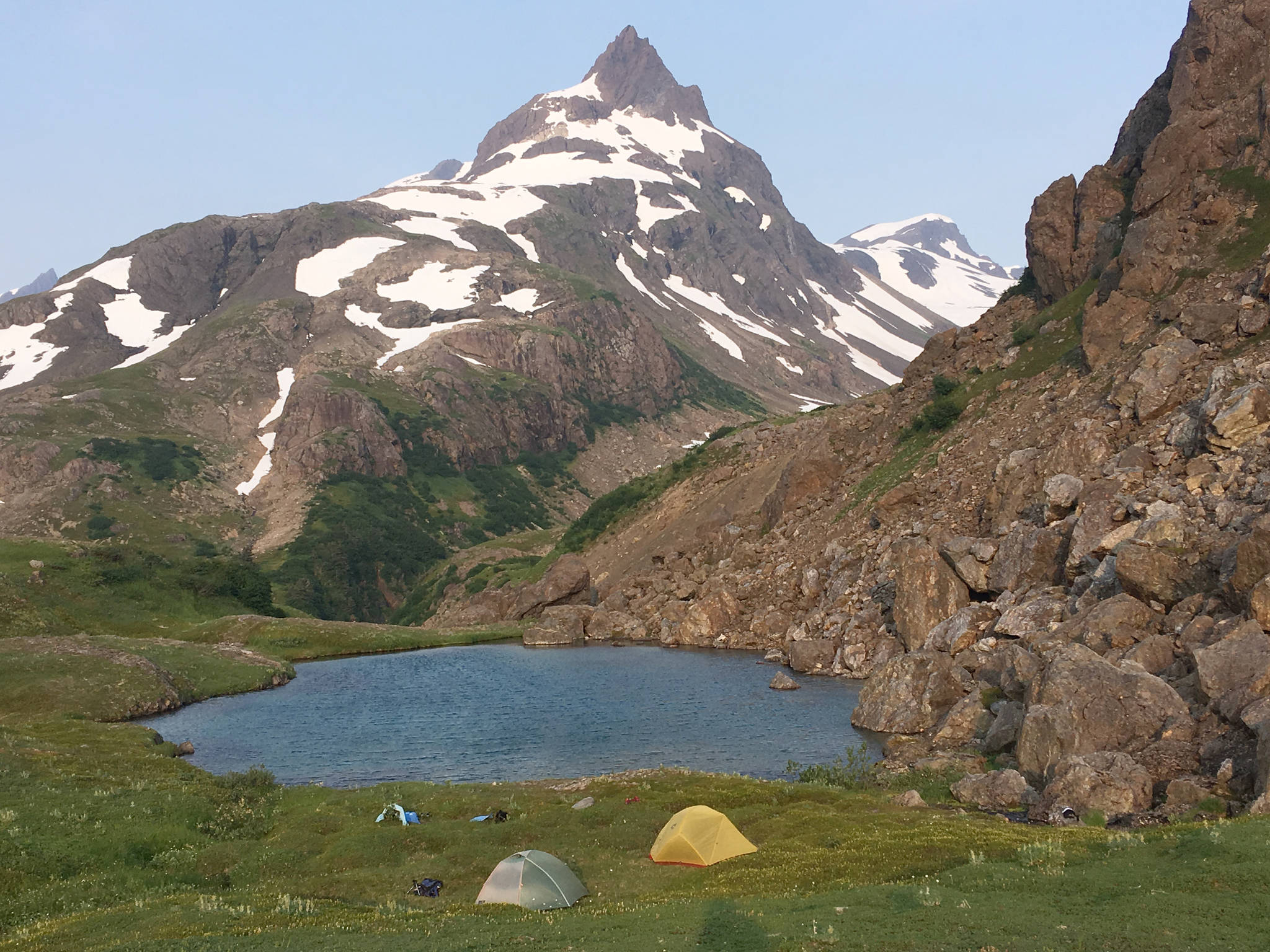 Jeff Helminiak / Peninsula Clarion                                A pair of tents sits at the Infinity Pools above the Tutka Backdoor Trail in Kachemak Bay State Park in July 2019.