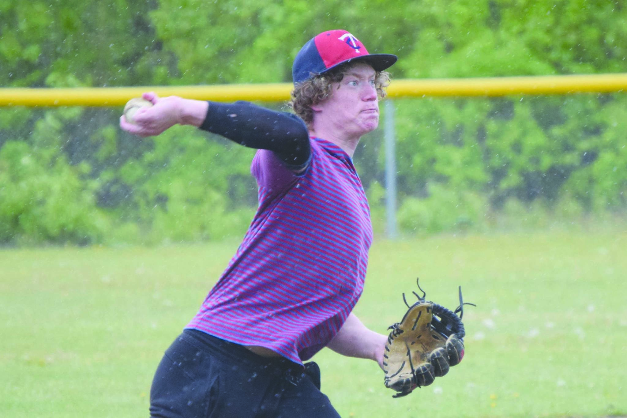 Alaska 20 shortstop Mose Hayes throws to first base during practice Monday, June 8, 2020, at the Soldotna baseball fields in Soldotna, Alaska. (Photo by Jeff Helminiak/Peninsula Clarion)