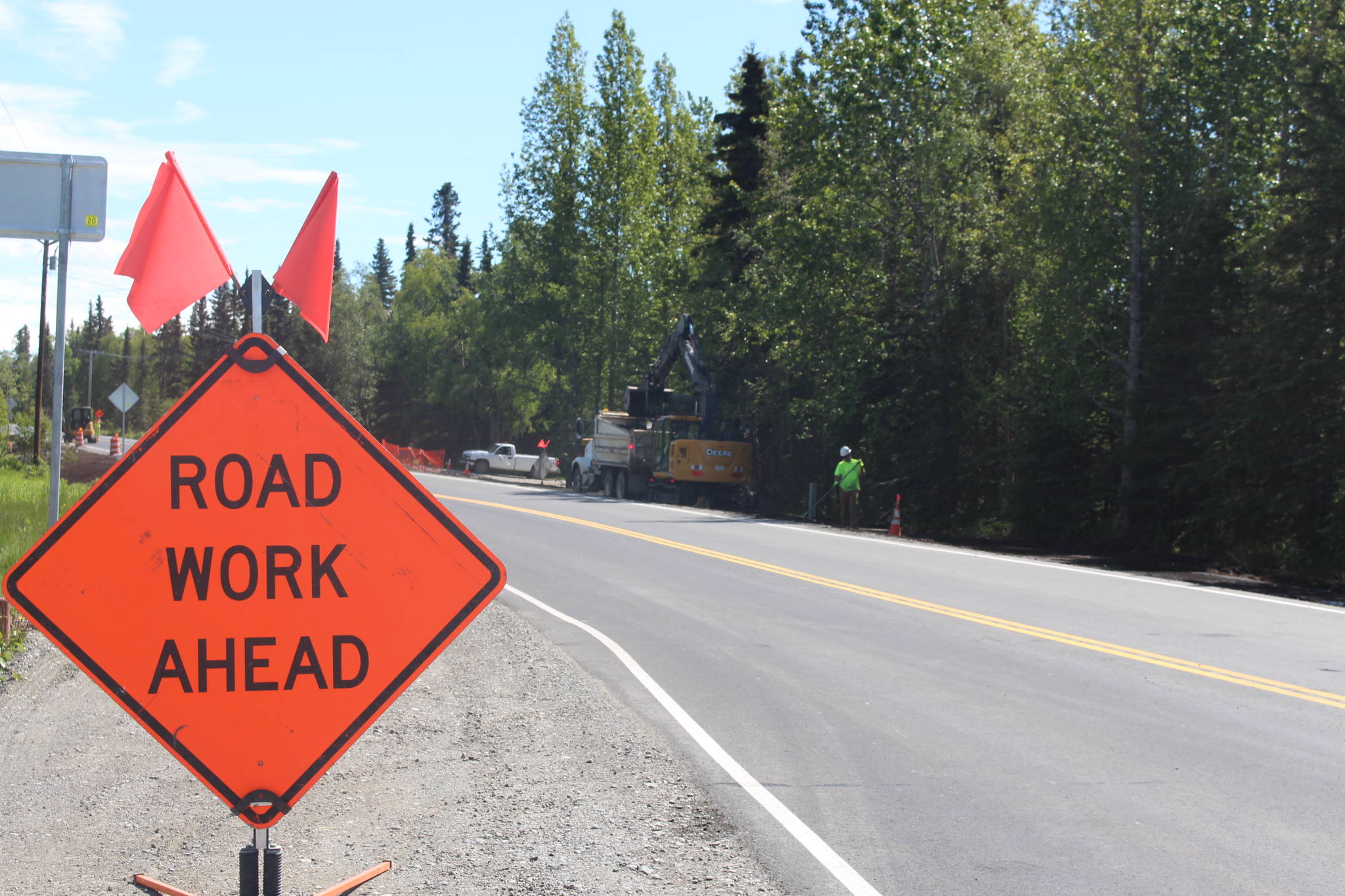 Road crews work on Beaver Loop Road in Kenai, Alaska, on June 15, 2020. (Photo by Brian Mazurek/Peninsula Clarion)