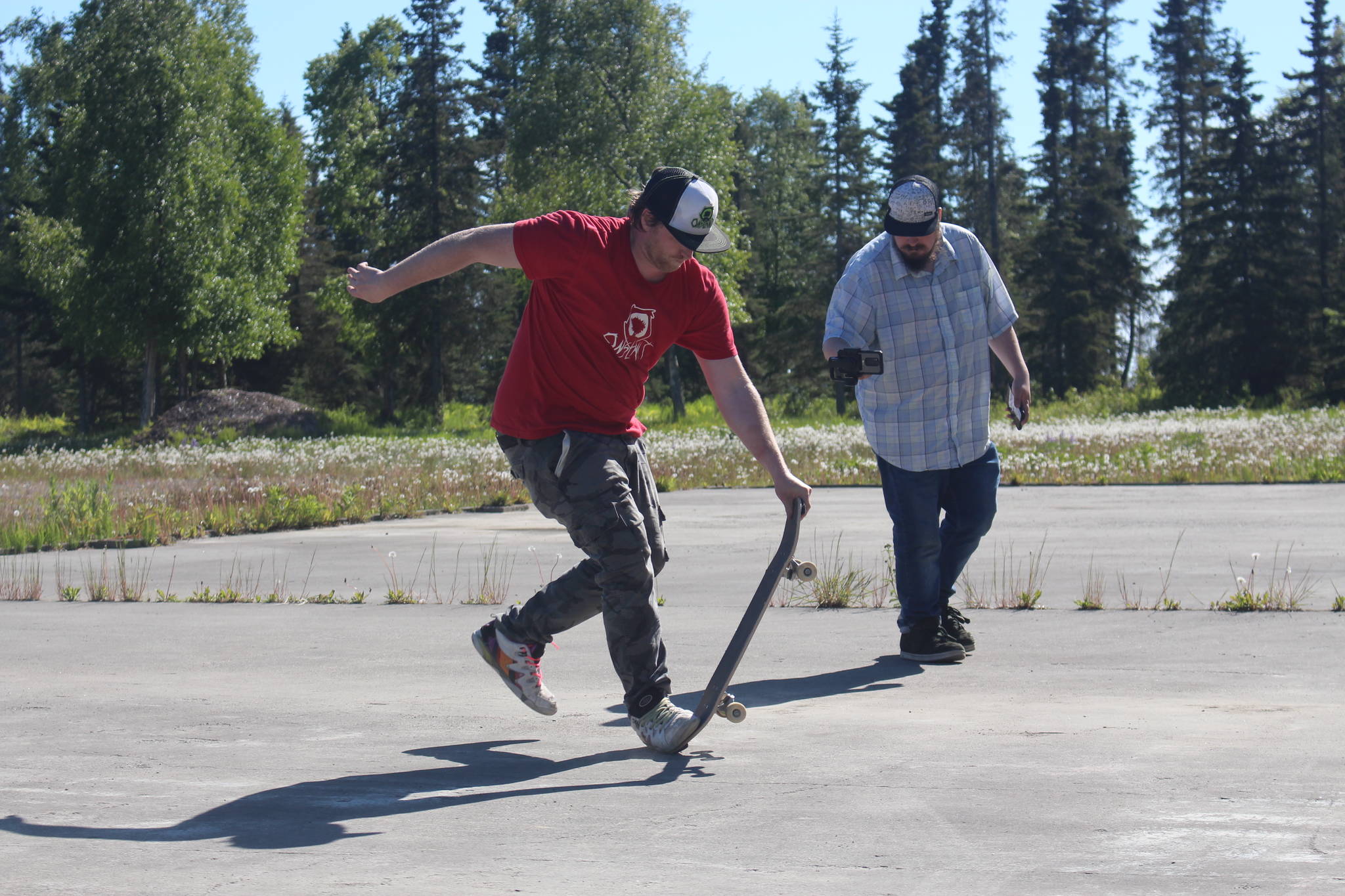 Nikiski skateboarder Vaughn Johnson records his run for the 2020 World Freestyle Roundup with the help of his friend and videographer Noah “Party Bear” Windhom in Nikiski, Alaska on June 14, 2020. (Photo by Brian Mazurek/Peninsula Clarion)