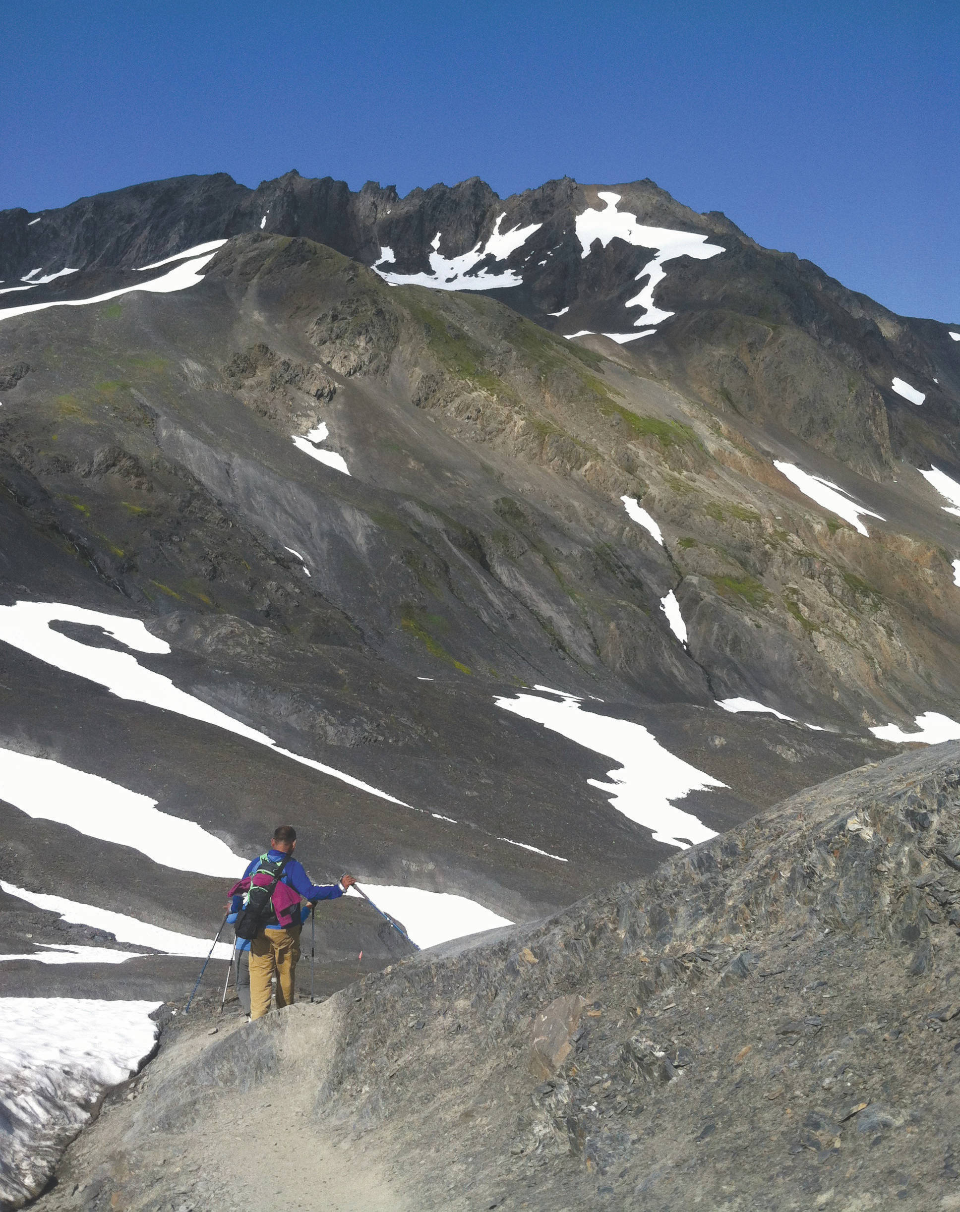 Hikers negotiate the Harding Icefield Trail in August 2015 in Kenai Fjords National Park just outside of Seward, Alaska. (Photo by Jeff Helminiak/Peninsula Clarion)