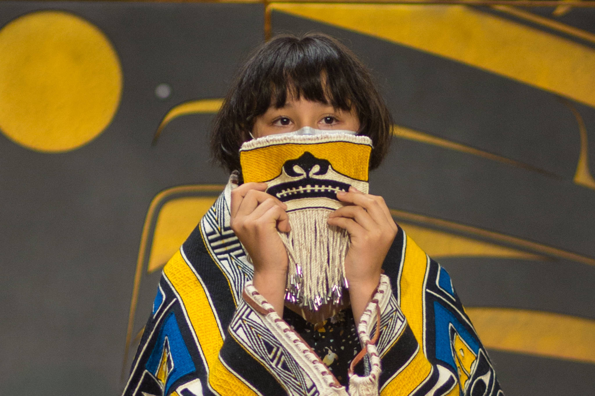 Courtesy Photo | Sydney Akagi Photography for Lily Hope                                Elizabeth Hope holds up the Chilkat Protector Mask at a ceremony.