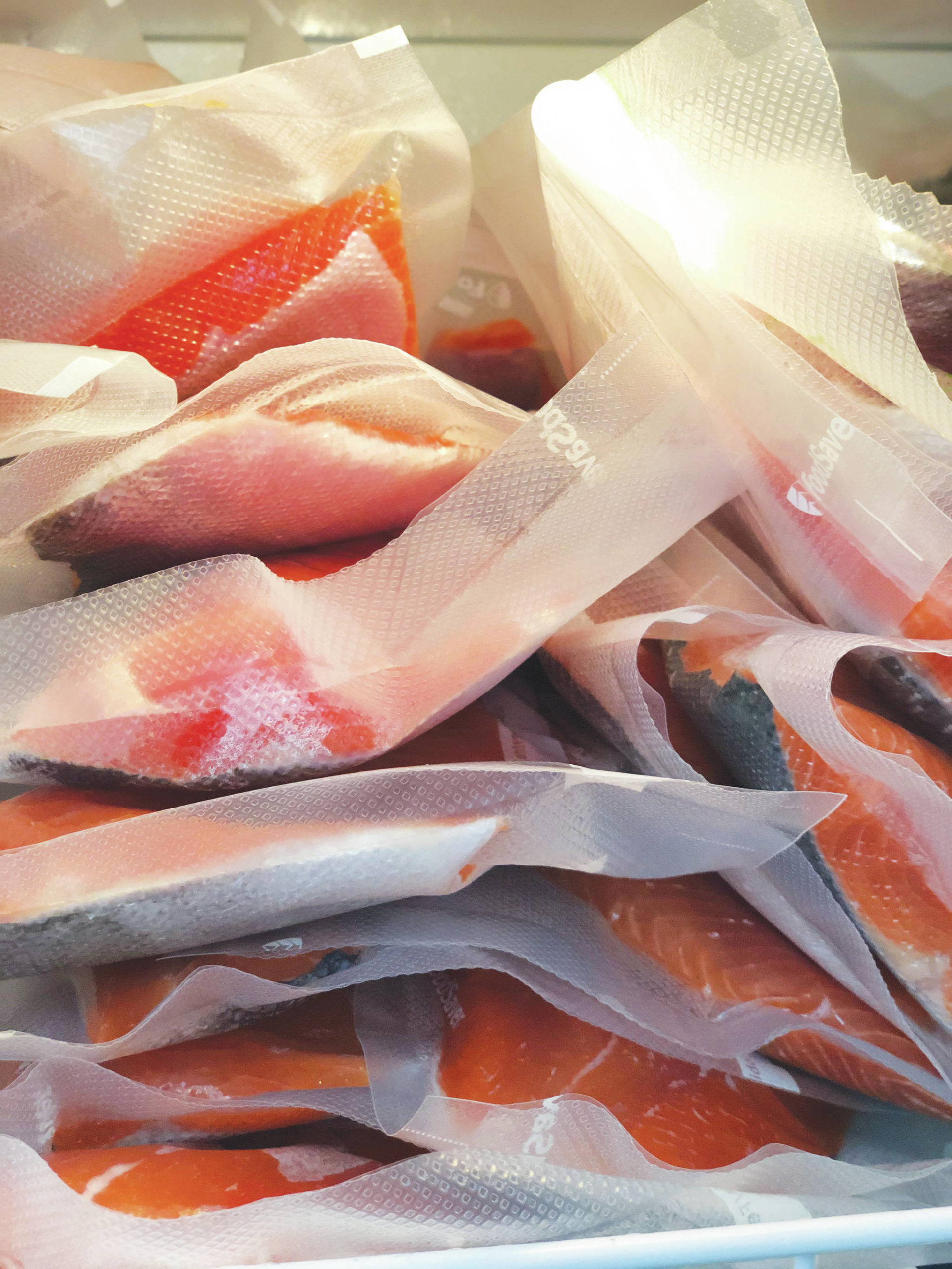 Frozen salmon is pictured in this July 2020 photograph. (Photo by Victoria Petersen/Peninsula Clarion )