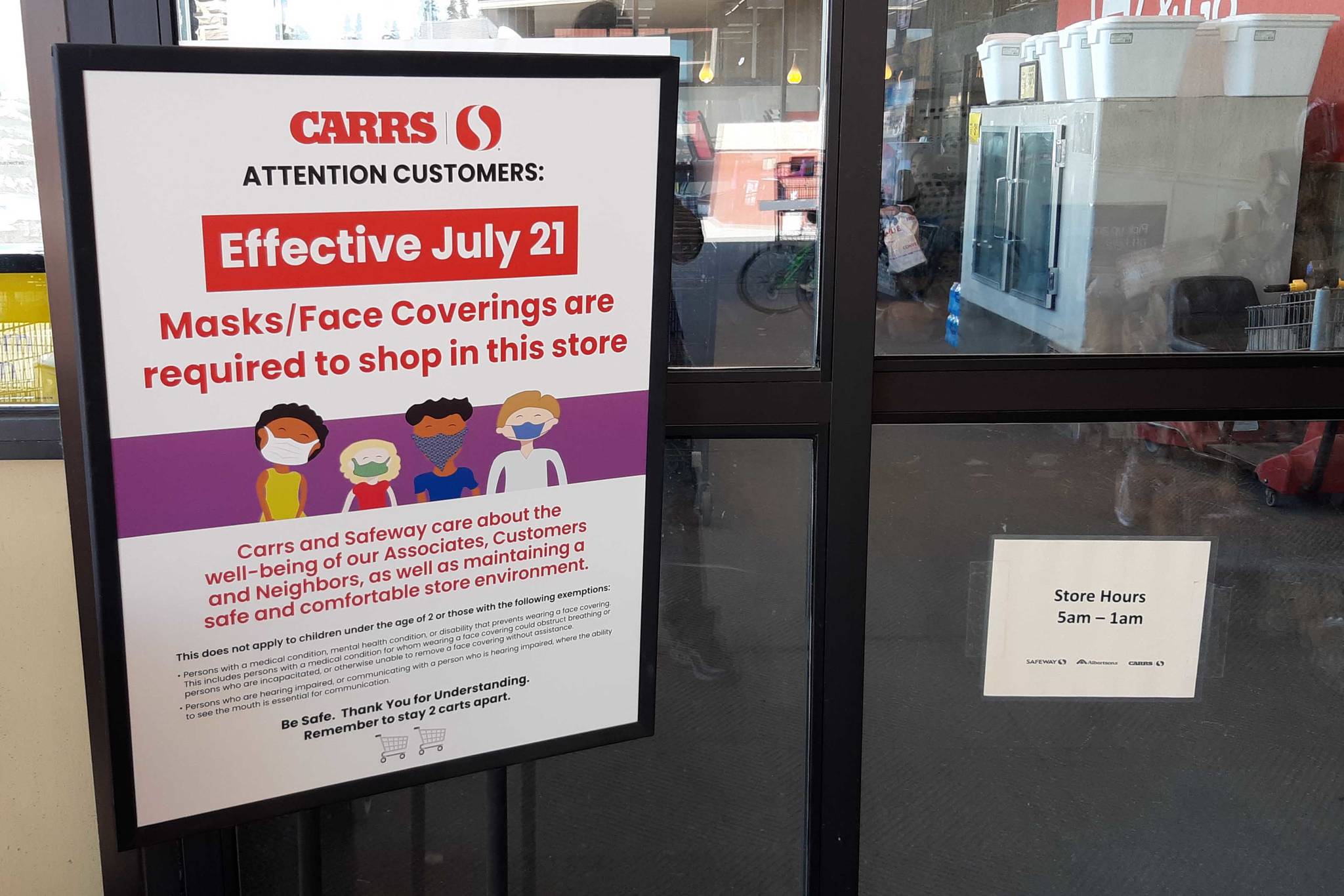 A sign detailing the store’s mask policy is seen here outside Safeway in Soldotna on July 21, 2020. (Photo by Brian Mazurek/Peninsula Clarion)