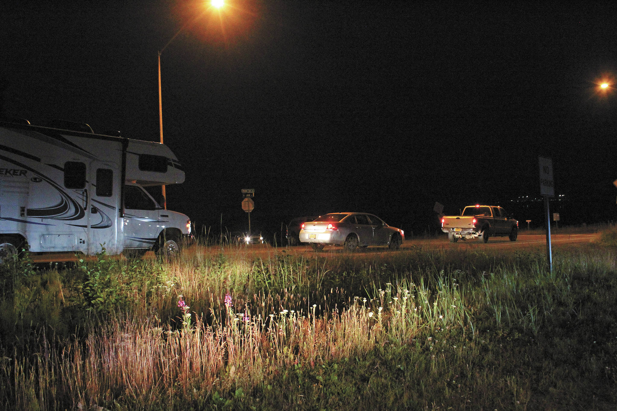 Vehicles are stopped and prevented from entering the Homer Spit on Wednesday, July 23, 2020 in Homer, Alaska. A tsunami warning was put into effect for Kachemak Bay and other areas of Alaska following a 7.8 magnitude earthquake off the Aleutian Chain on Tuesday night. Those in the inundation zone in Homer were asked to evacuate. (Photo by Megan Pacer/Homer News)