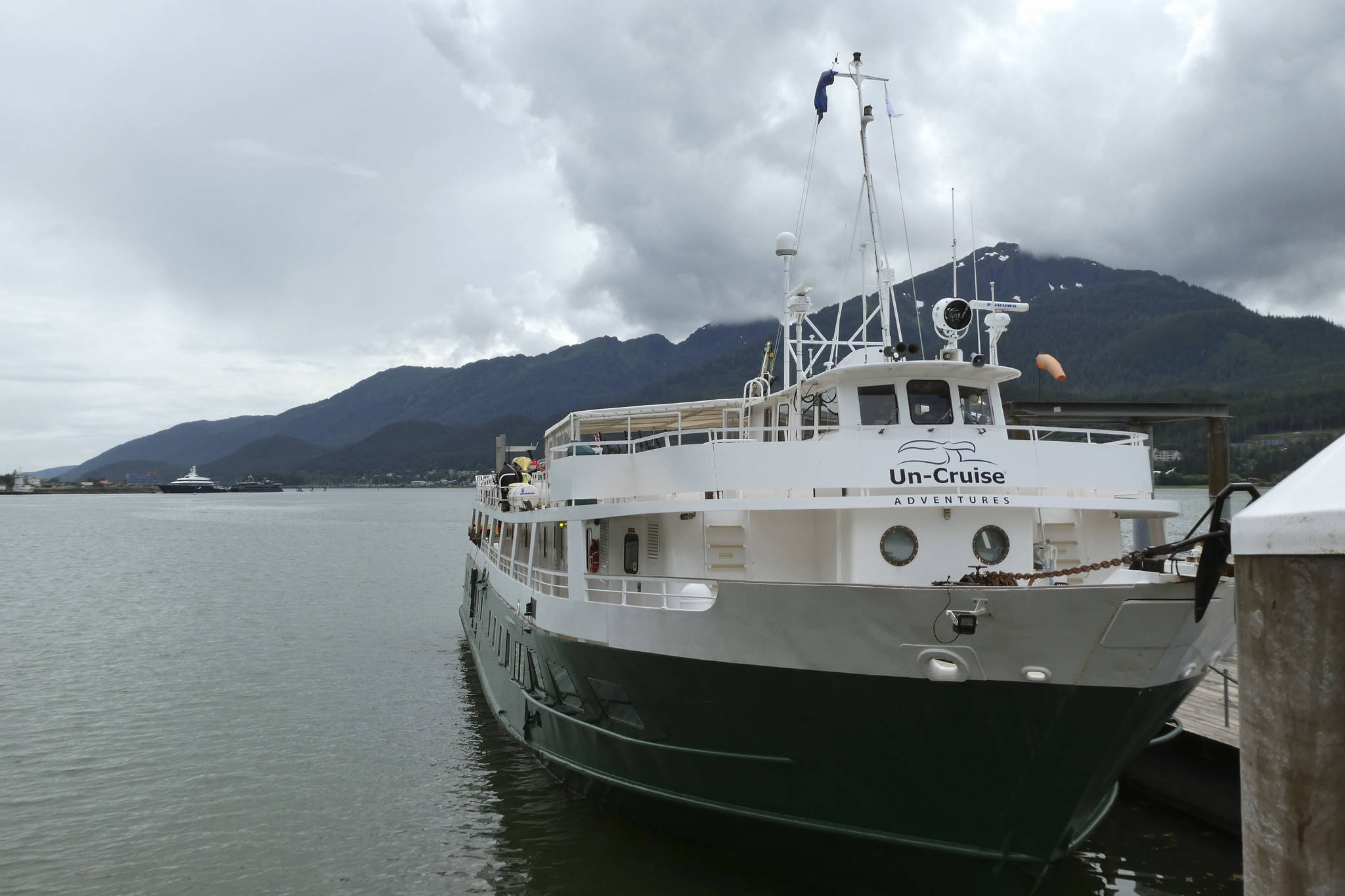 The Wilderness Adventurer is shown Wednesday, Aug. 5, 2020, following its return to Juneau, Alaska, after one of its 36 passengers tested positive for COVID-19. The first cruise of the stunted season was cut short, and all passengers were required to quarantine at a hotel while the 30 crew members were to quarantine on the ship. (AP Photo/Becky Bohrer)