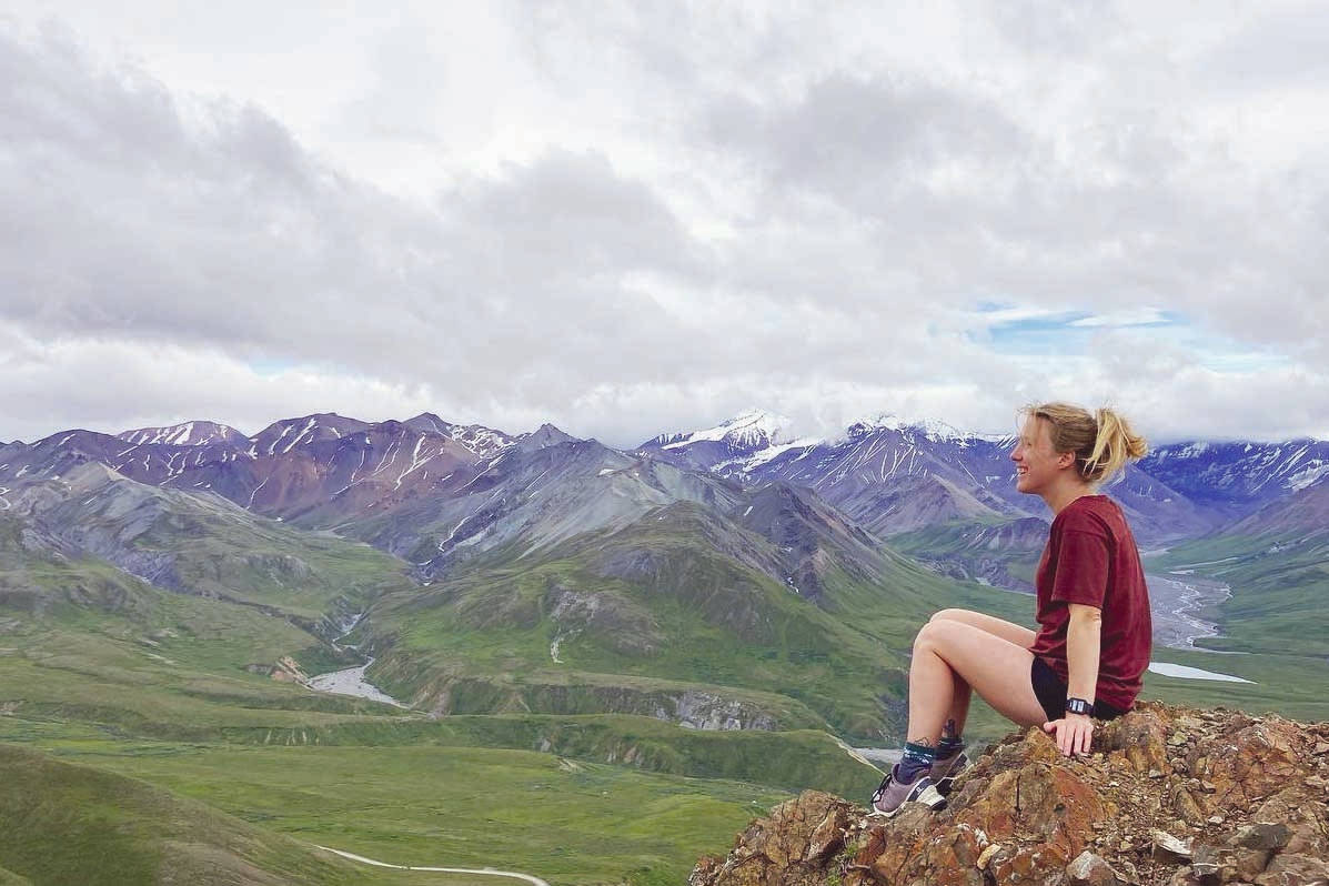 The author is seen here in July pleasantly enjoying a mountaintop in Denali National Park, with no training in mind. (Photo courtesy of Gillian Braver)
